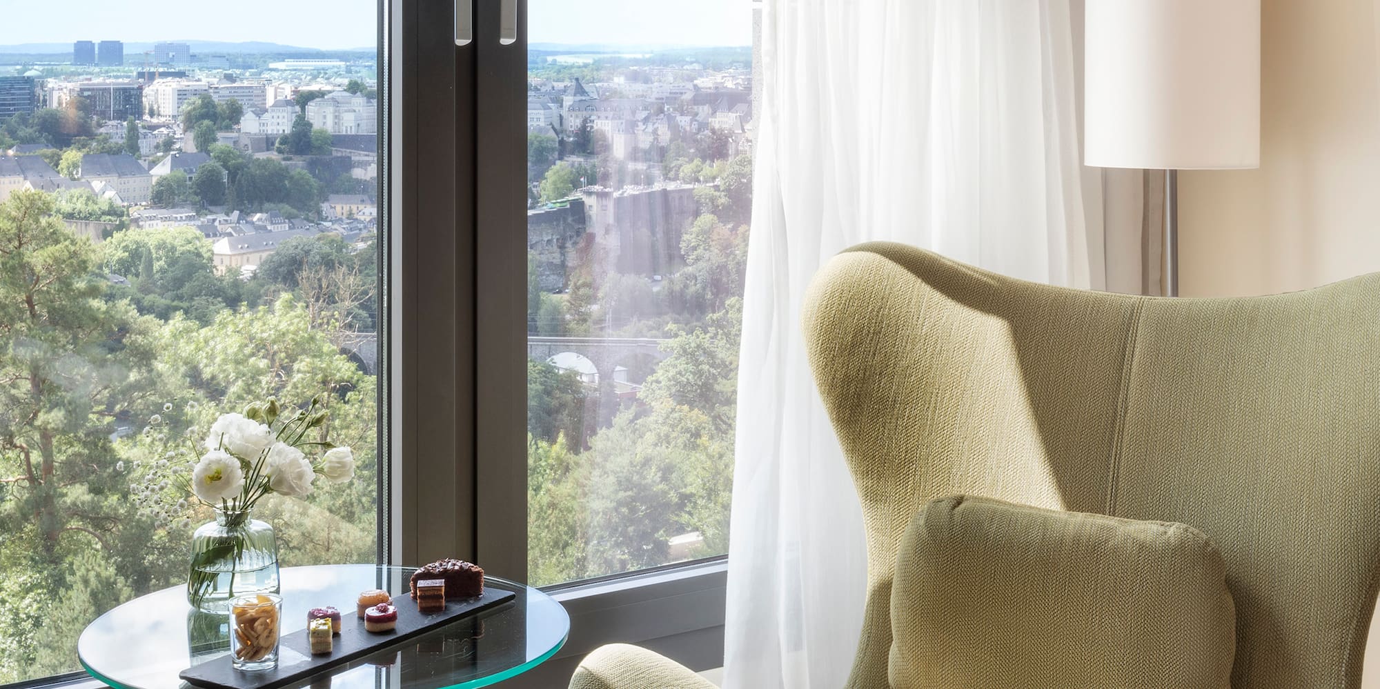 a chair next to a window