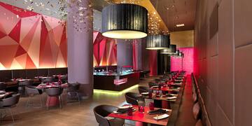 a restaurant with tables and chairs