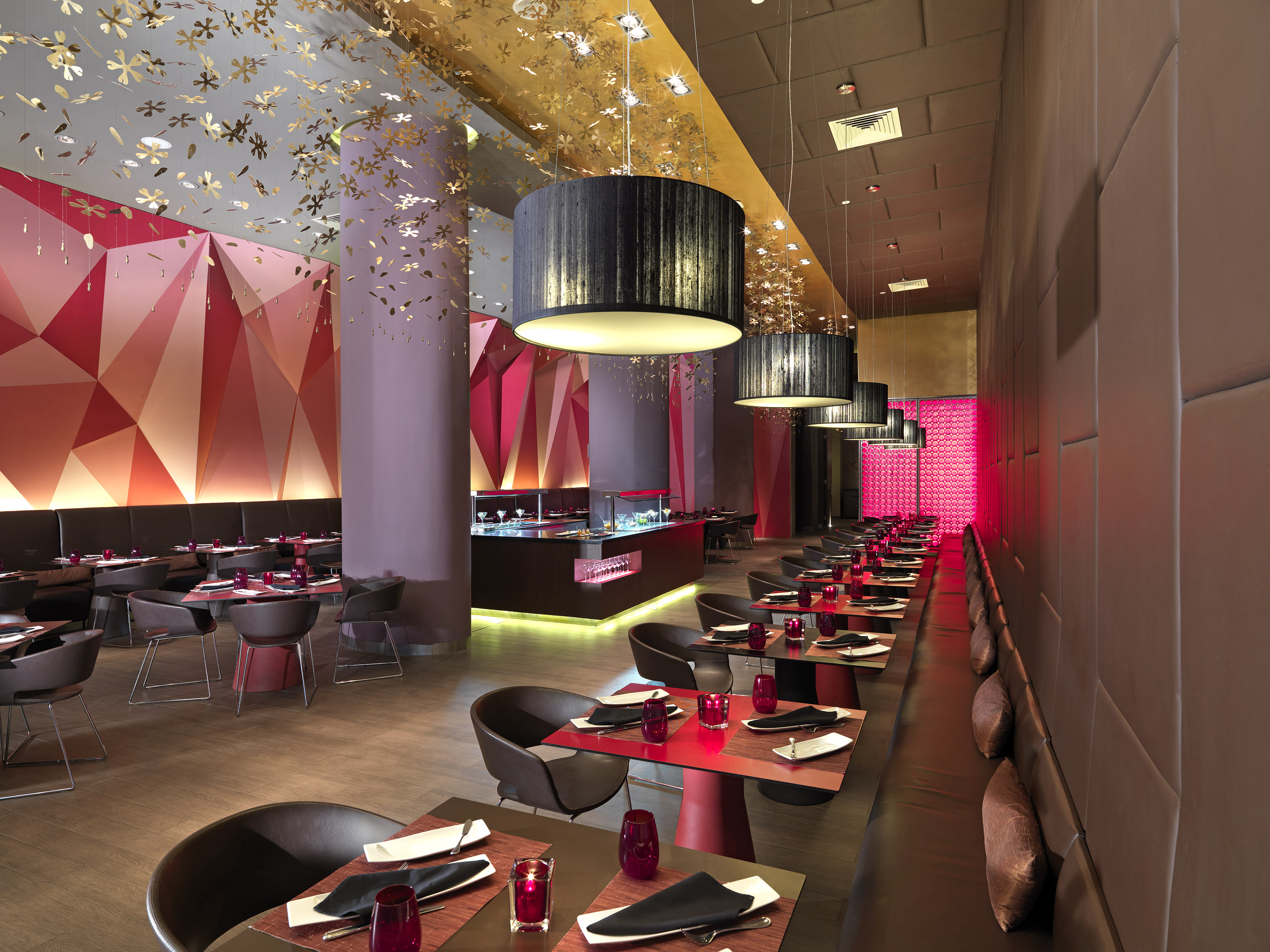 a restaurant with tables and chairs