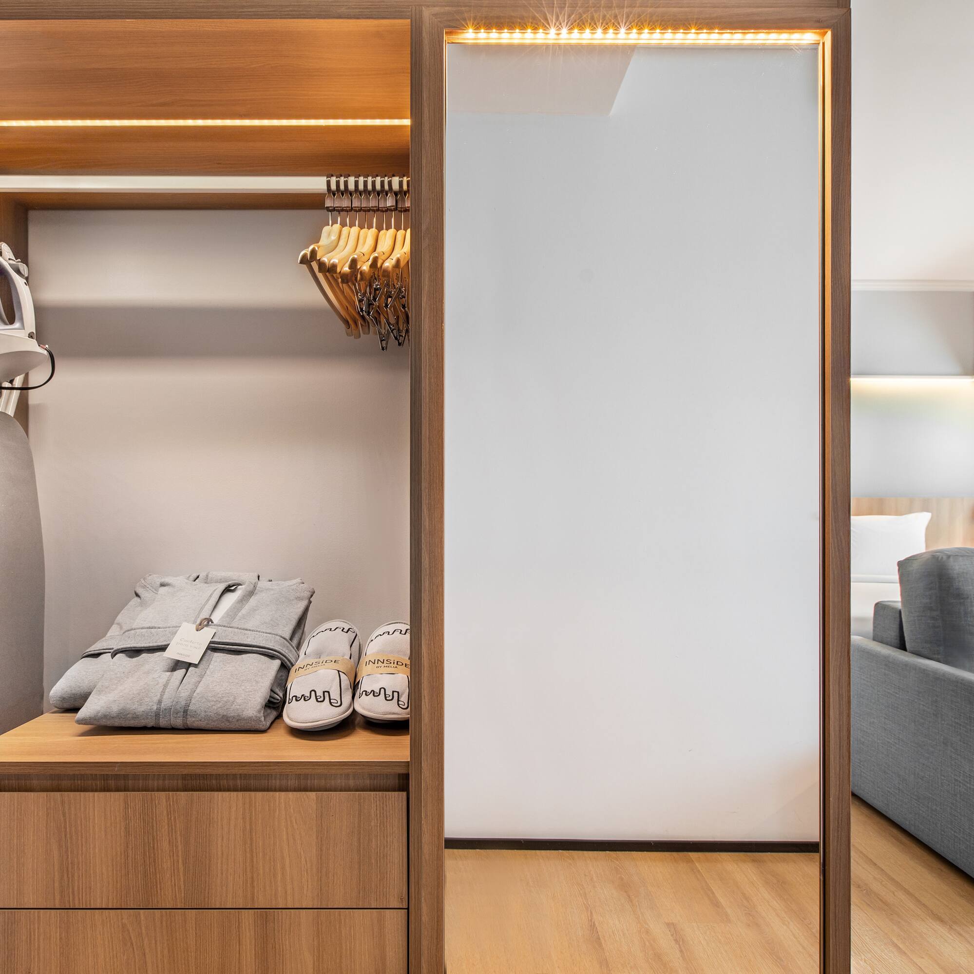 a closet with clothes on it