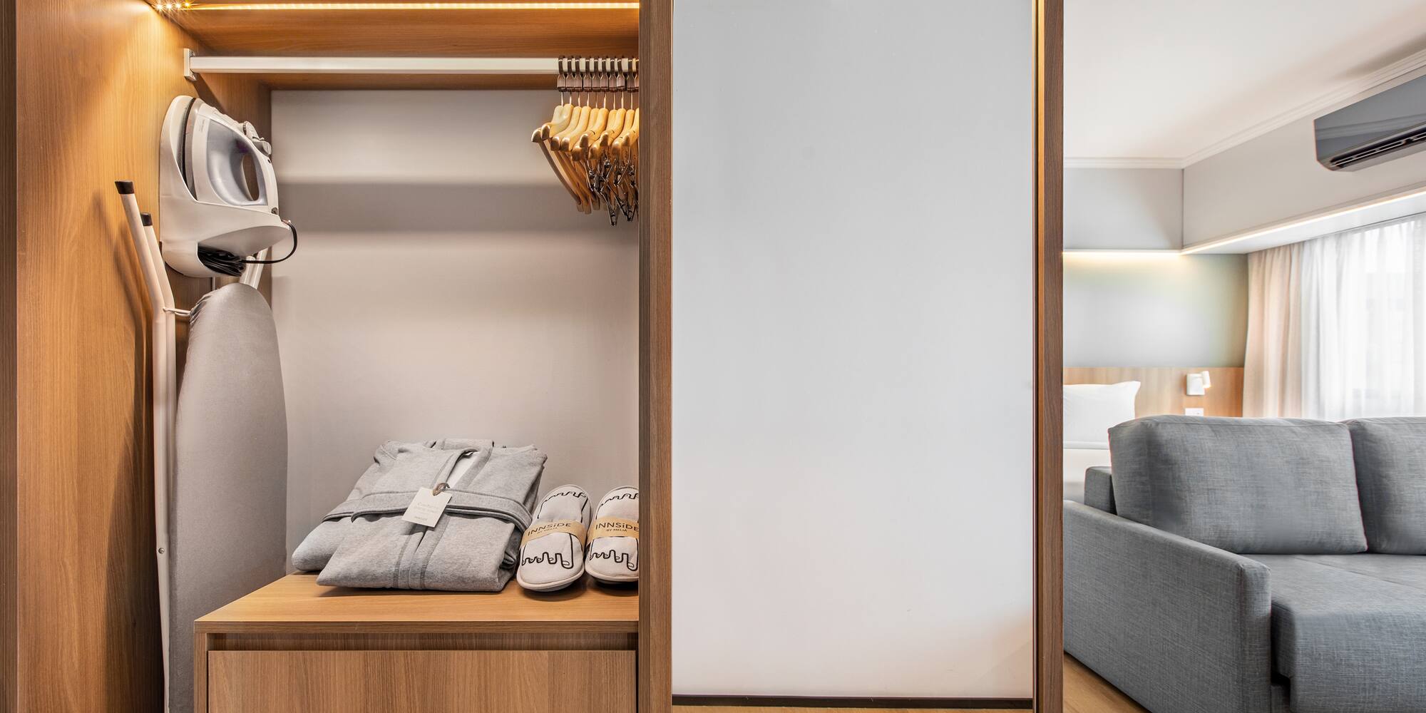 a closet with clothes on it