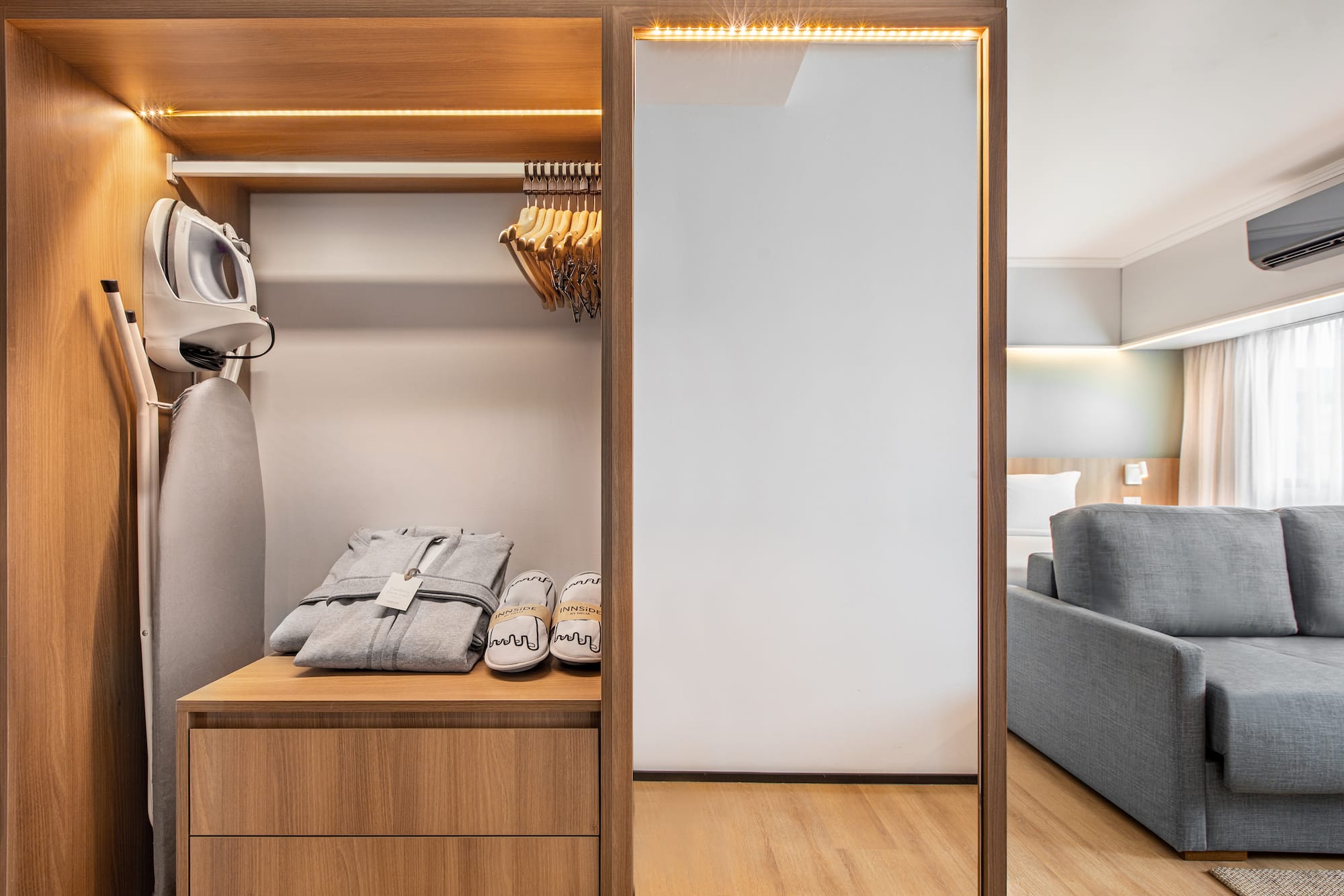 a closet with clothes on it