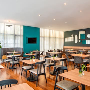 a room with tables and chairs