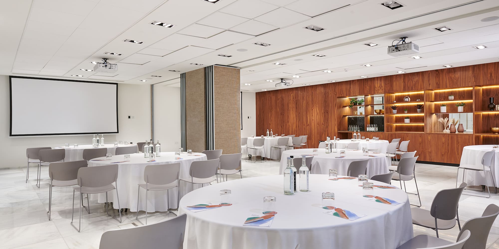 a room with tables and chairs