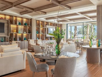 a room with tables and chairs