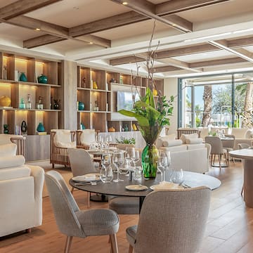 a room with tables and chairs