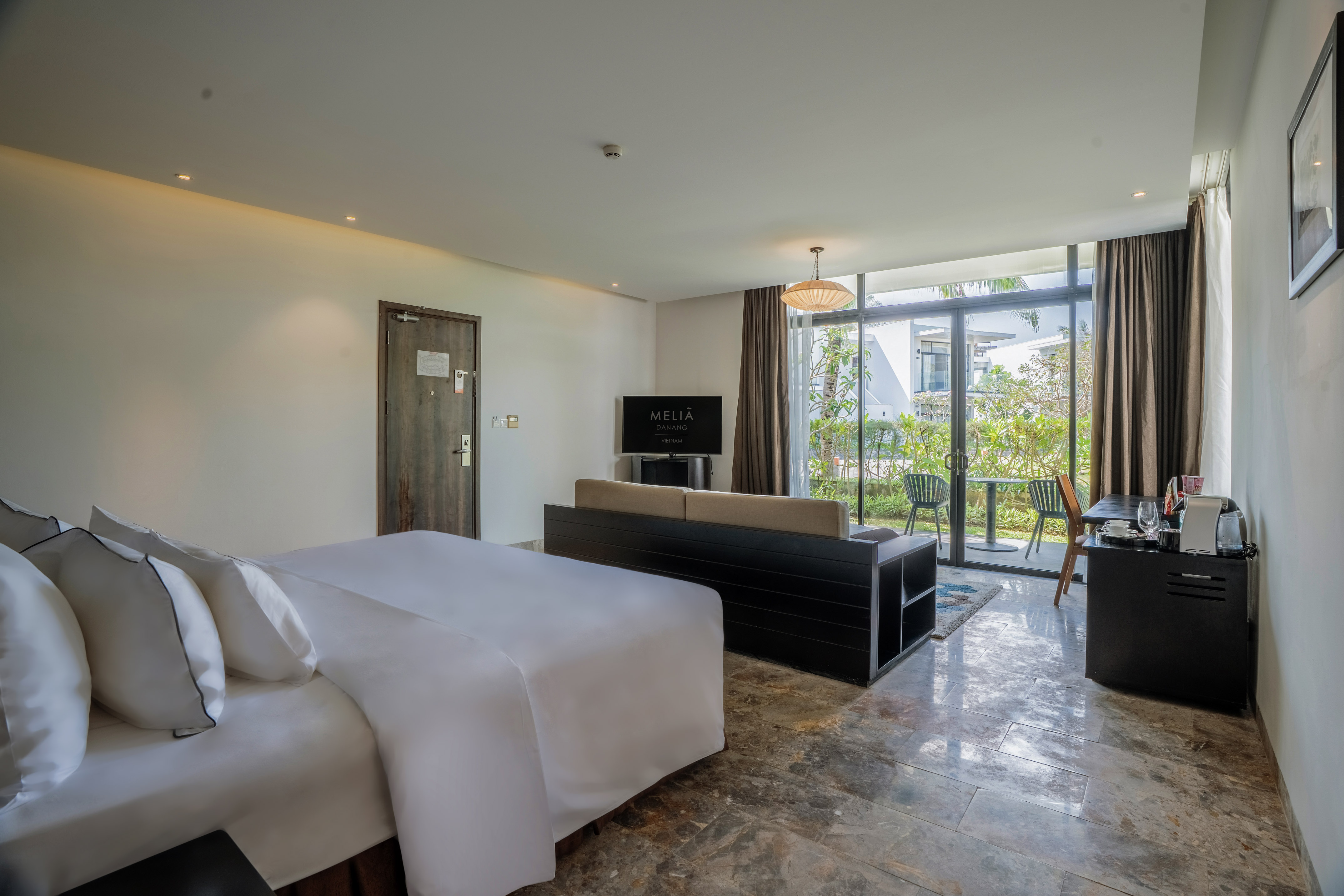 a room with a bed and a couch