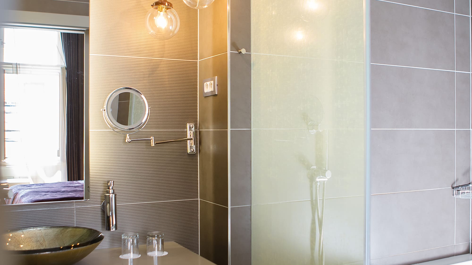 a bathroom with a sink and shower