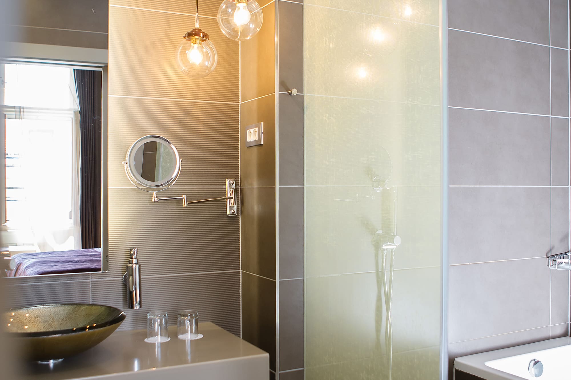 a bathroom with a sink and shower