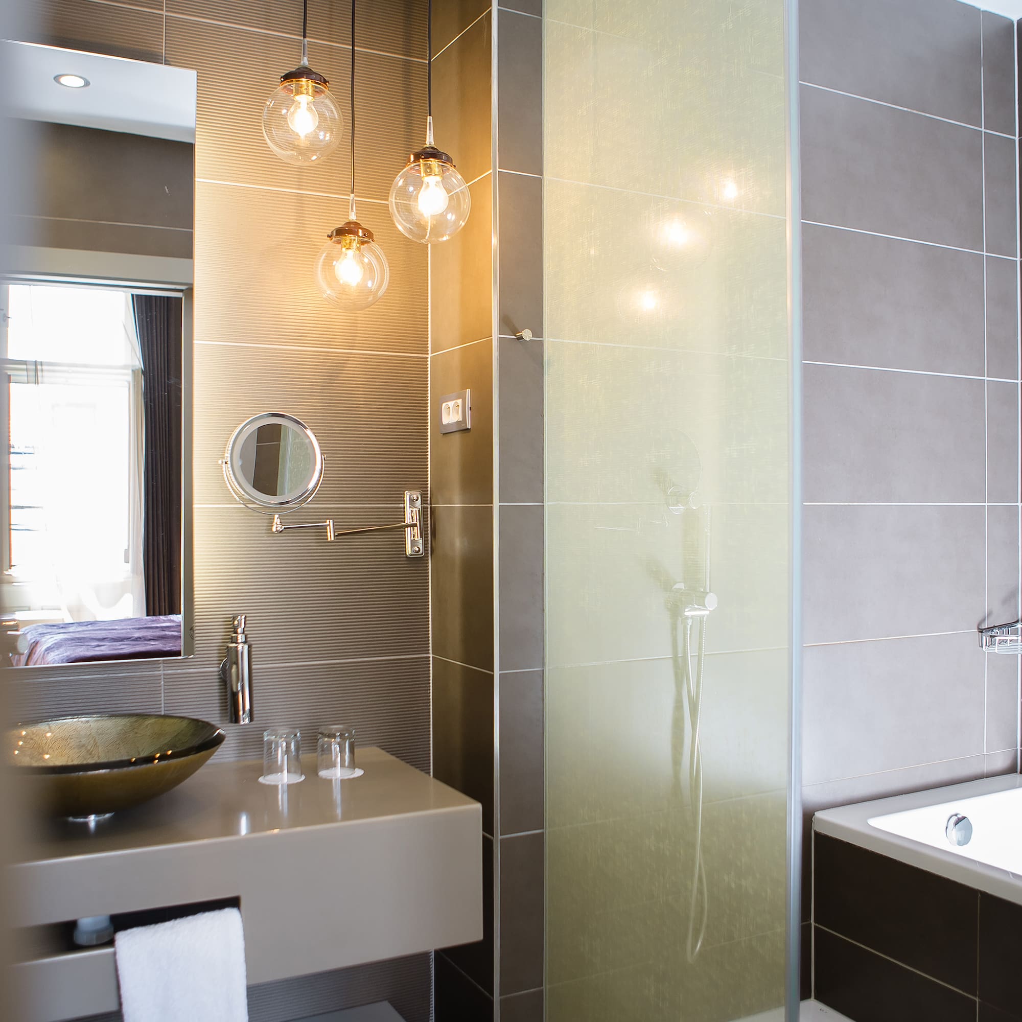a bathroom with a sink and shower