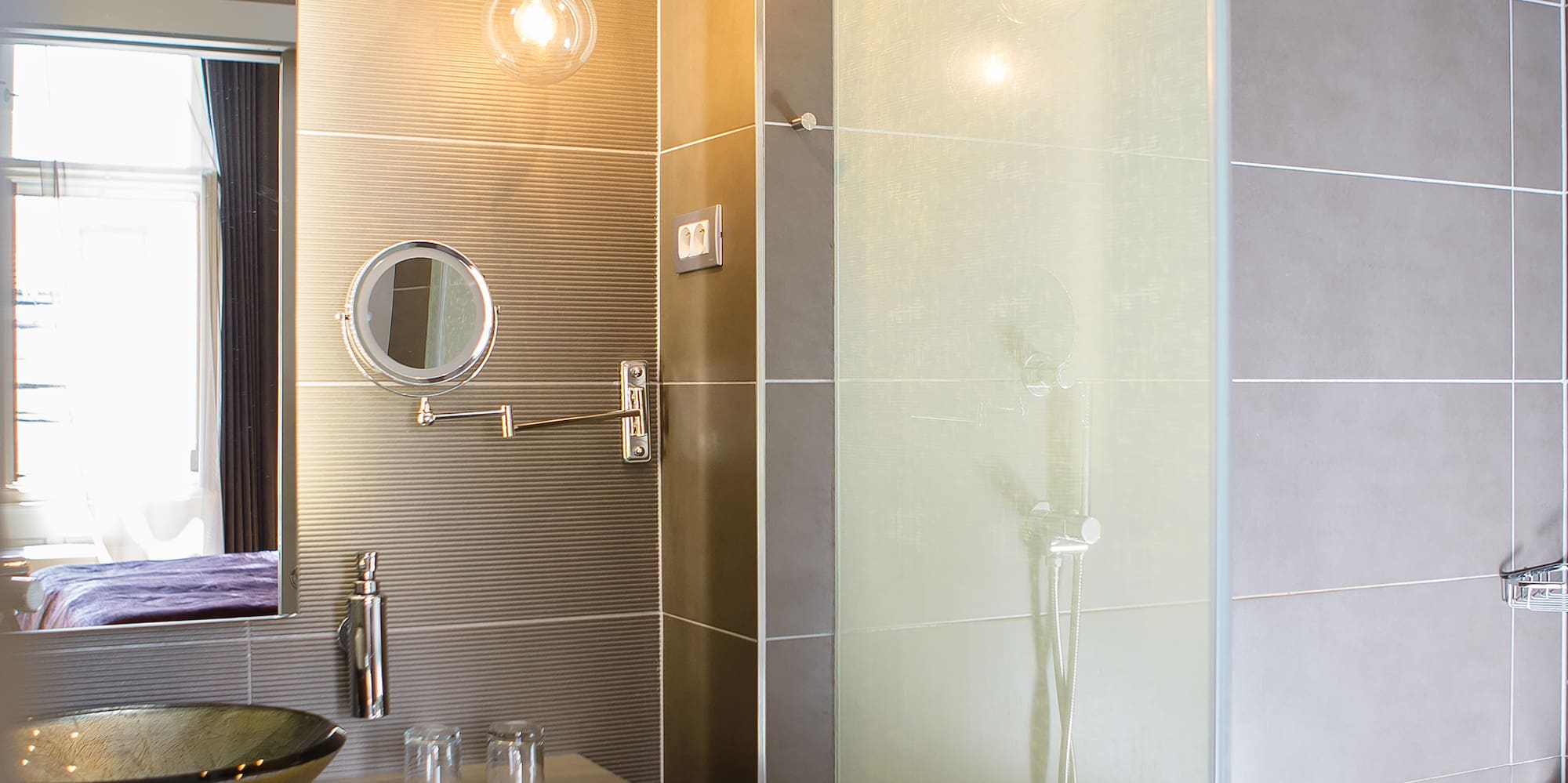 a bathroom with a sink and shower