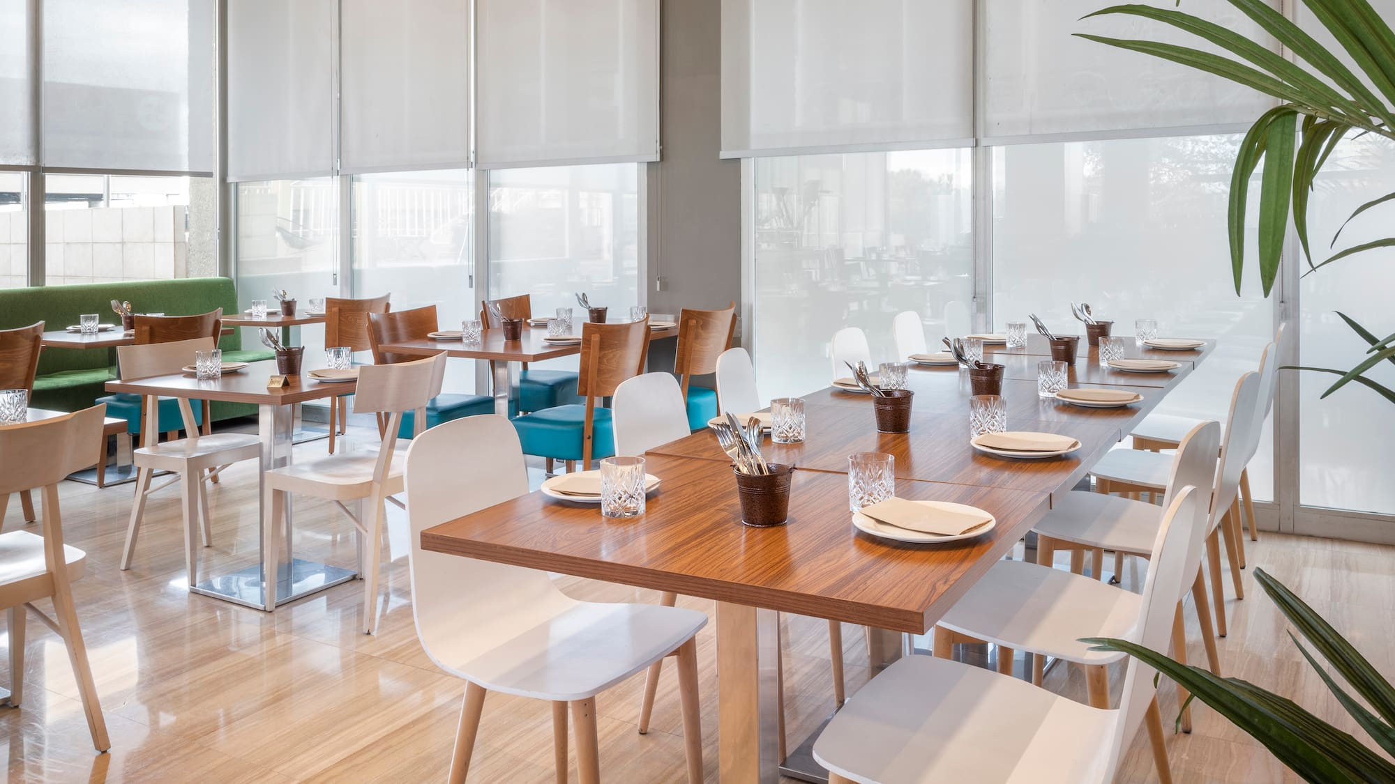 a room with tables and chairs