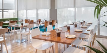 a room with tables and chairs