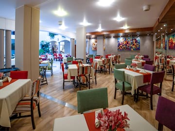 a room with tables and chairs