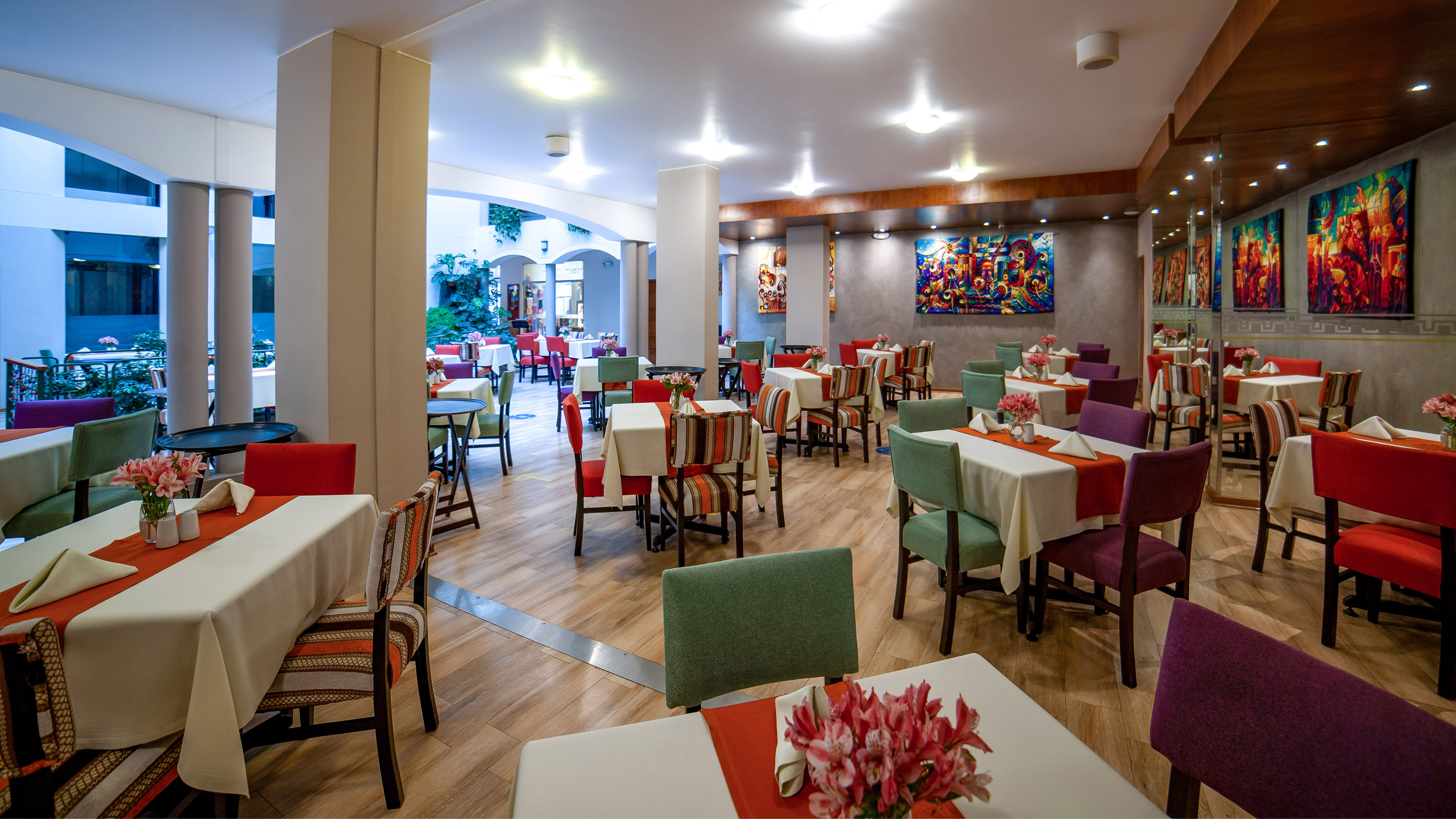 a room with tables and chairs