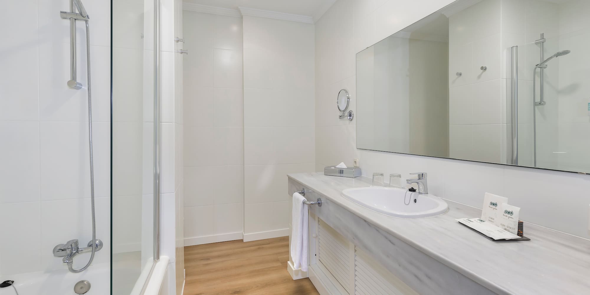 a bathroom with a mirror and sink