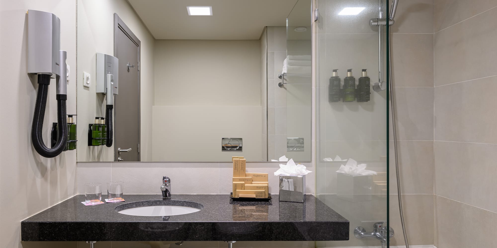 a bathroom with a sink and a shower