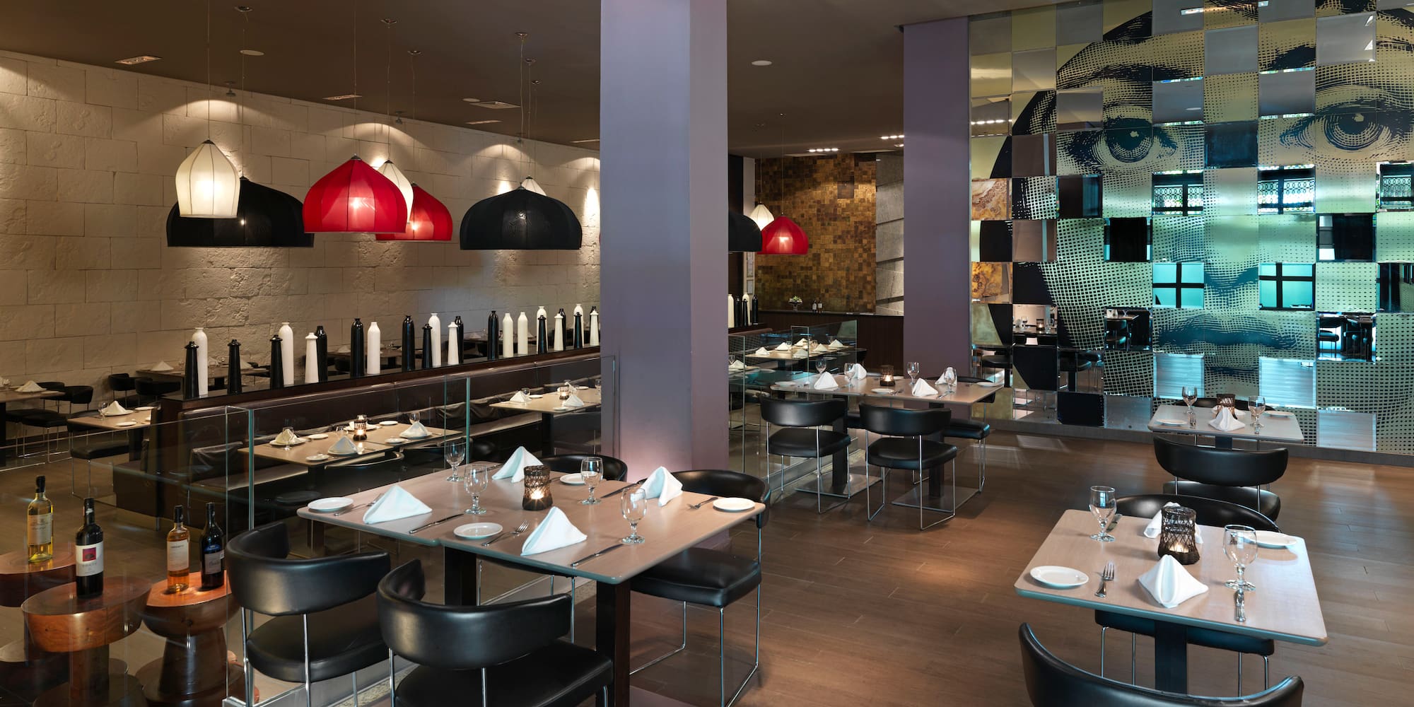 a restaurant with tables and chairs