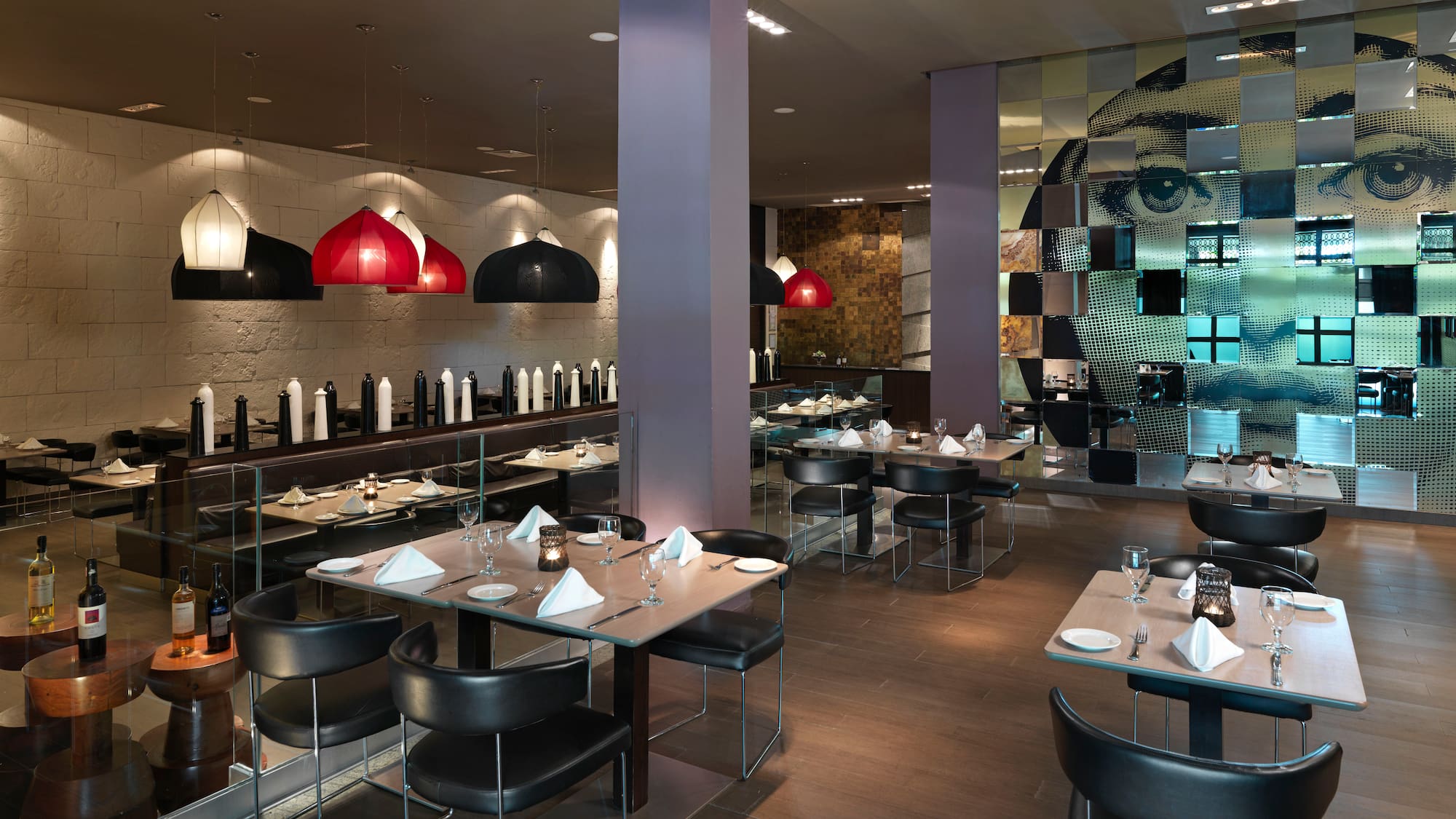 a restaurant with tables and chairs