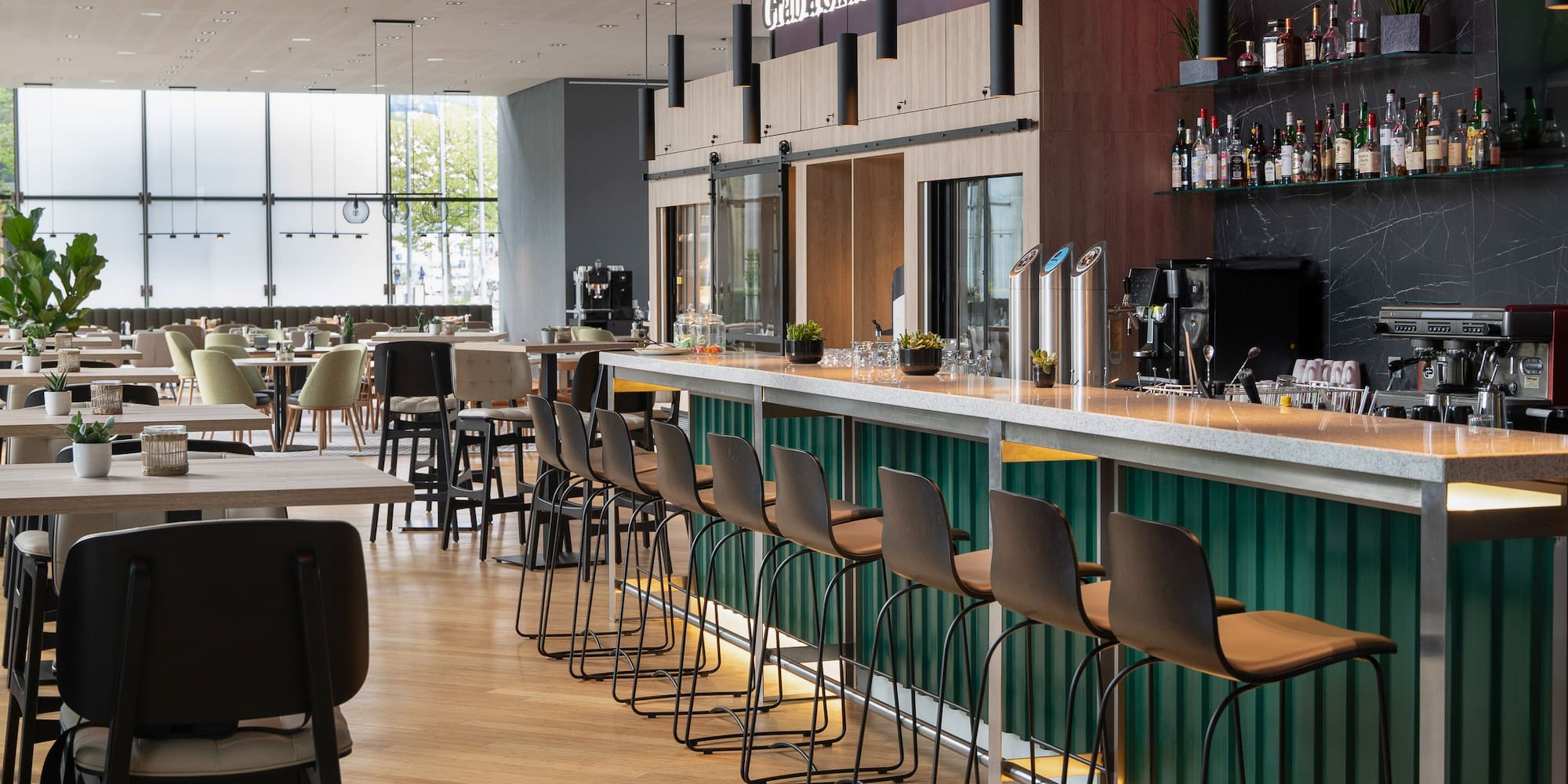 a bar with chairs and tables