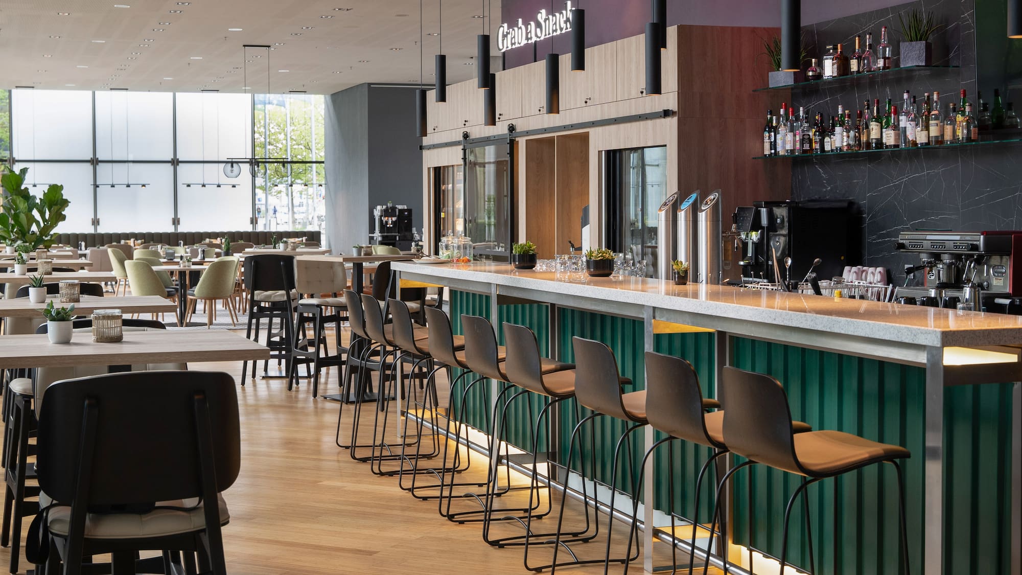 a bar with chairs and tables