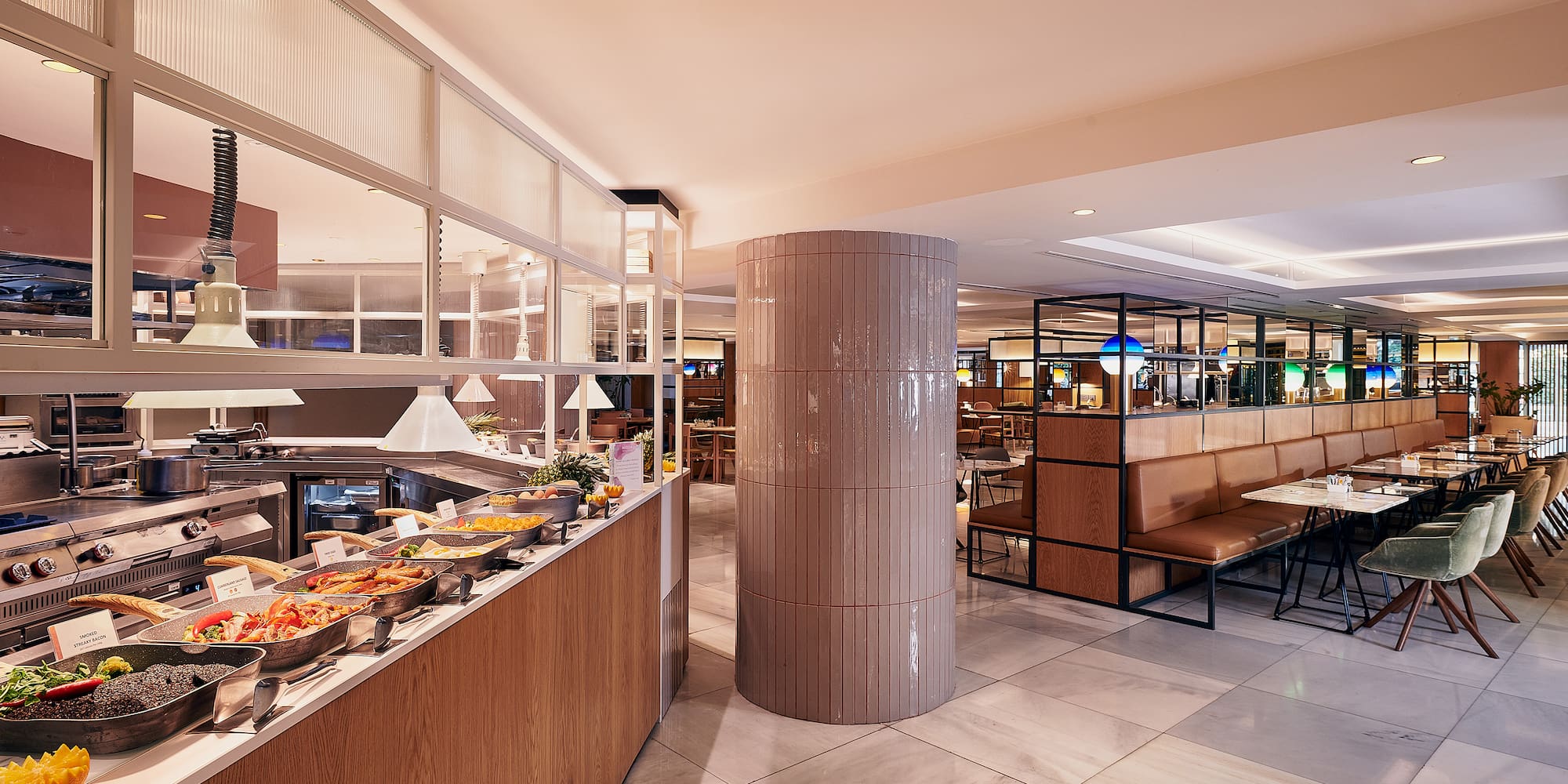 a restaurant with food on the counter