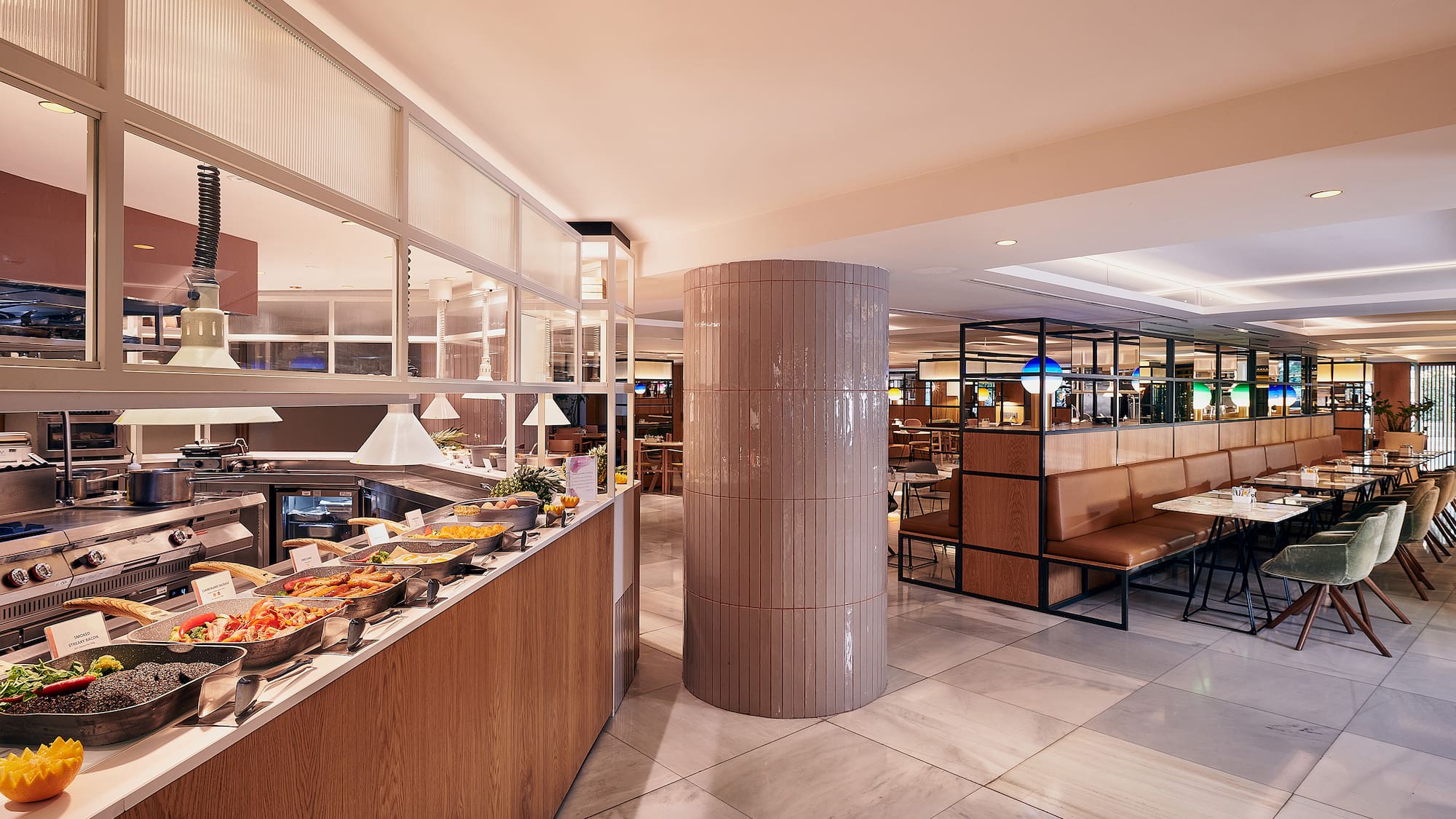 a restaurant with food on the counter