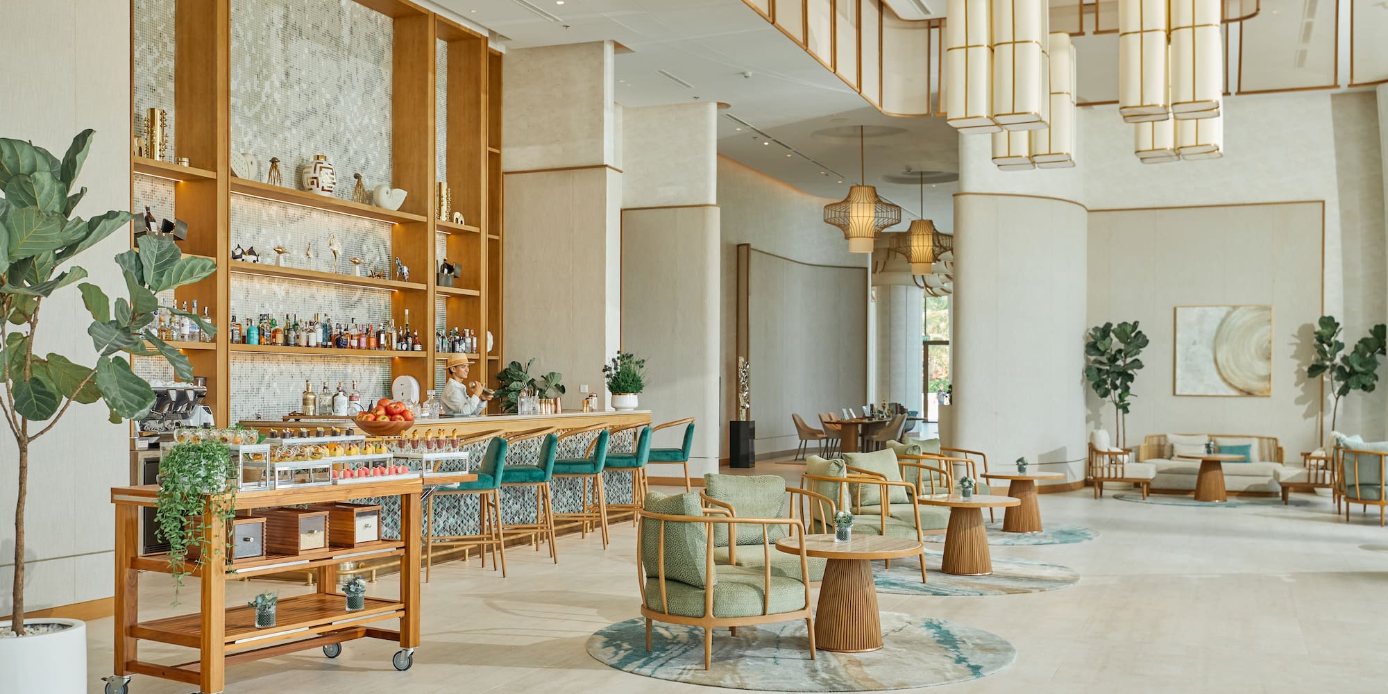 a room with a bar and chairs