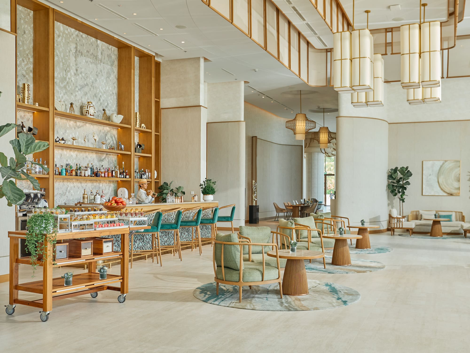a room with a bar and chairs