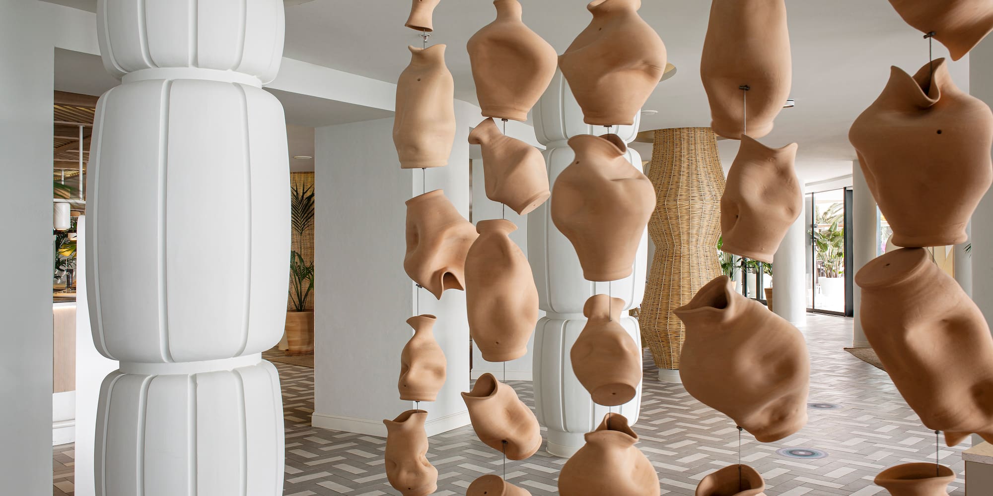 clay pots from a ceiling