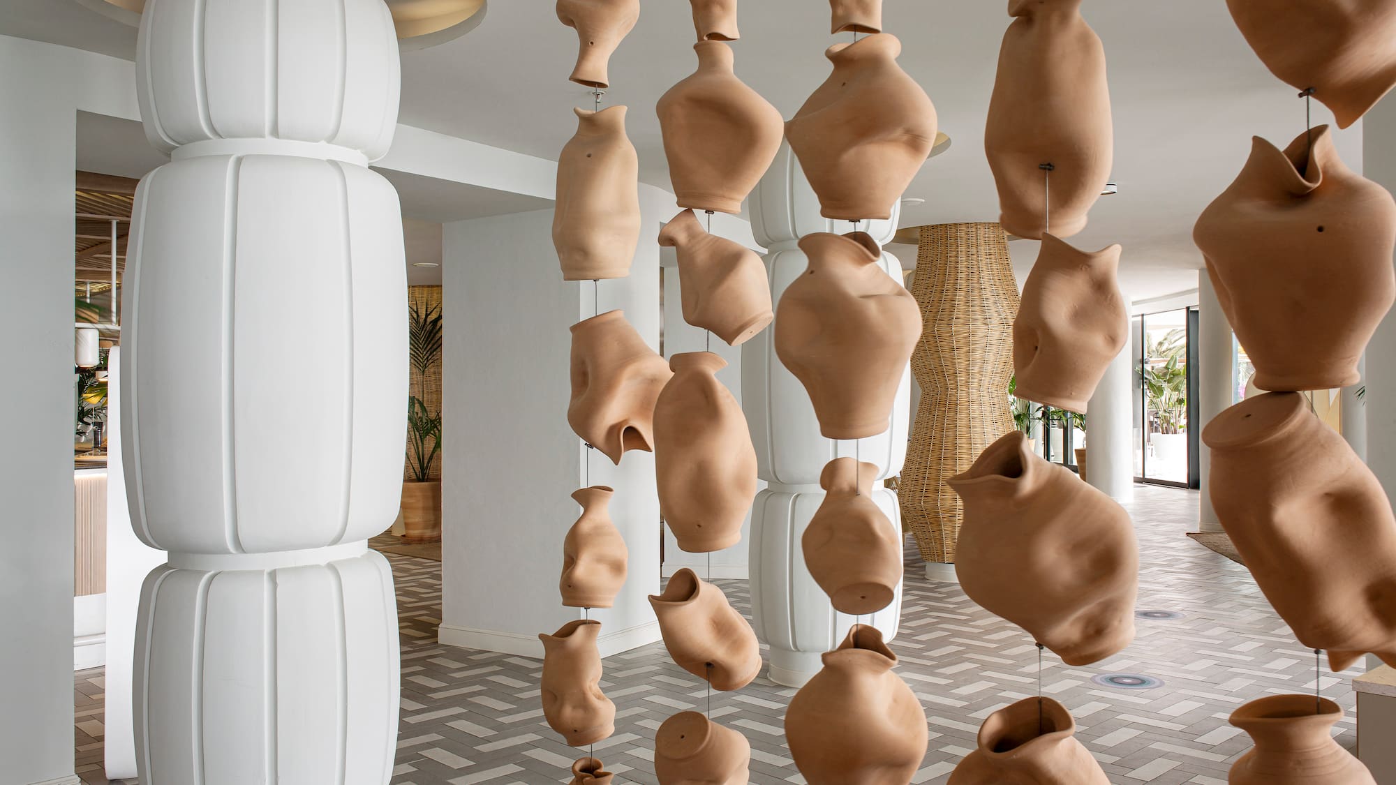 clay pots from a ceiling