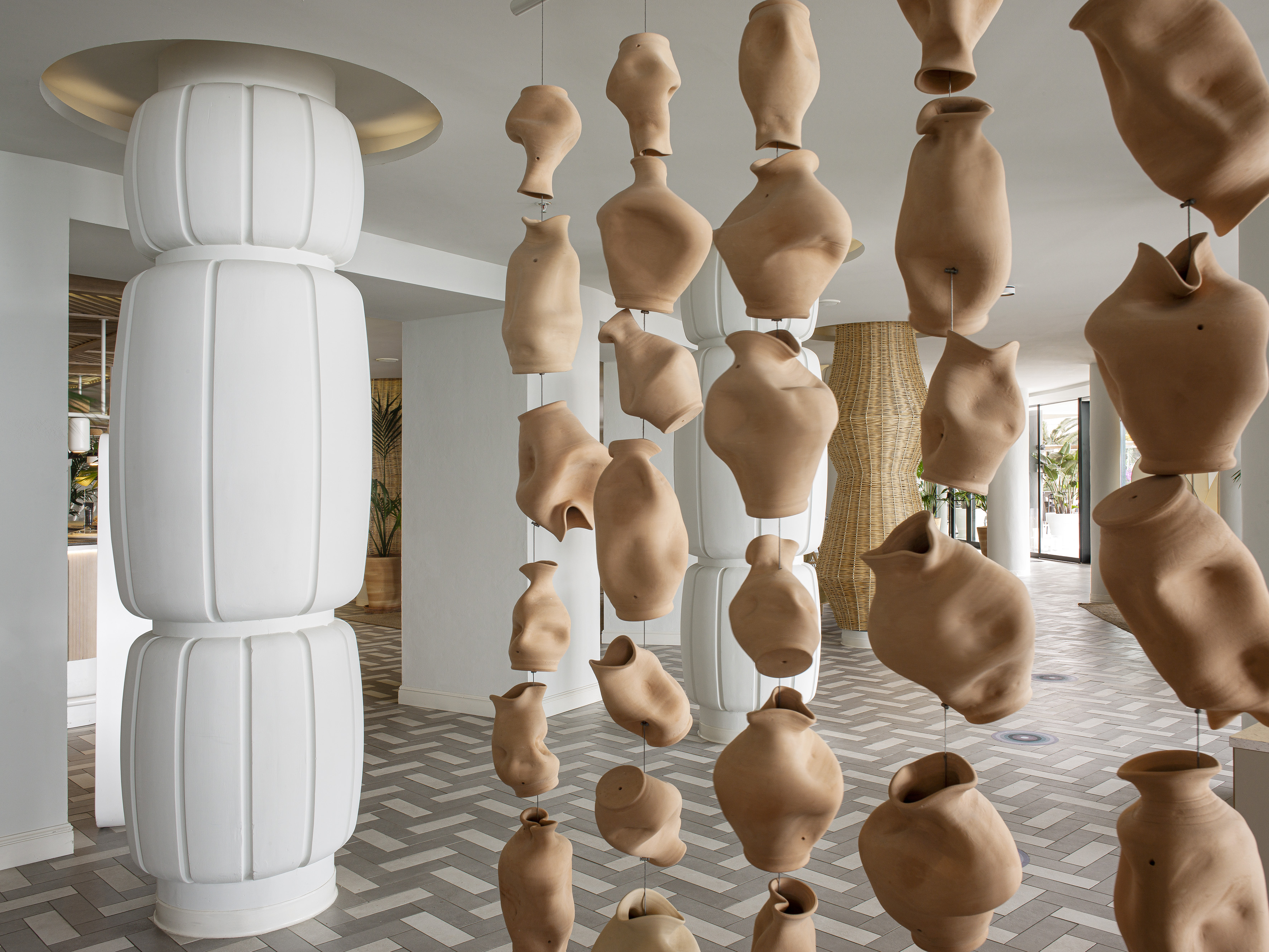 clay pots from a ceiling