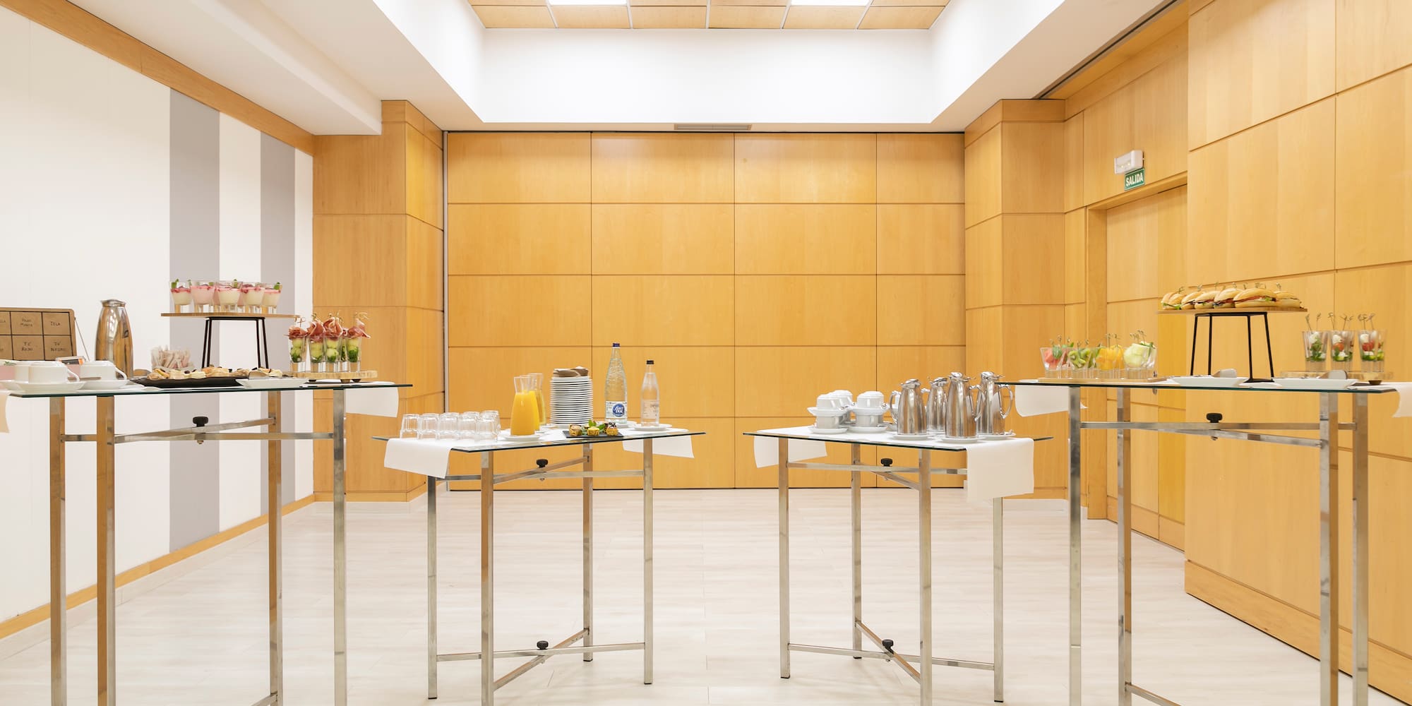 a room with tables and drinks