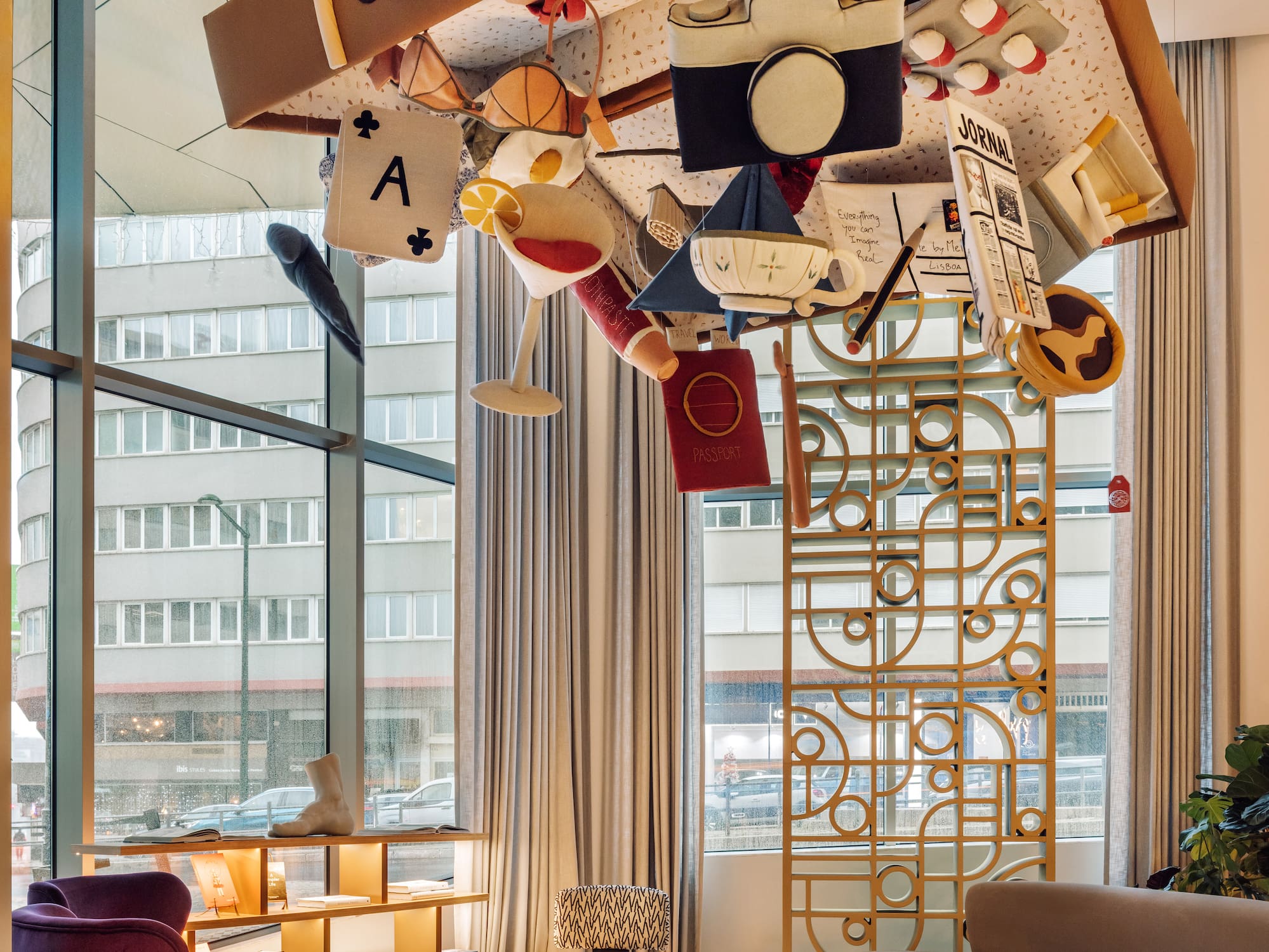 a room with a large window and a large room with a large window