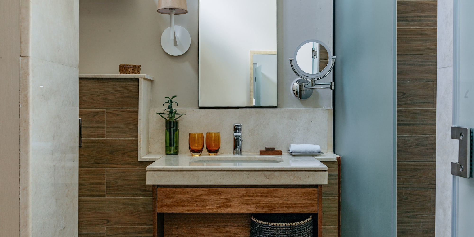 a bathroom with a mirror and sink