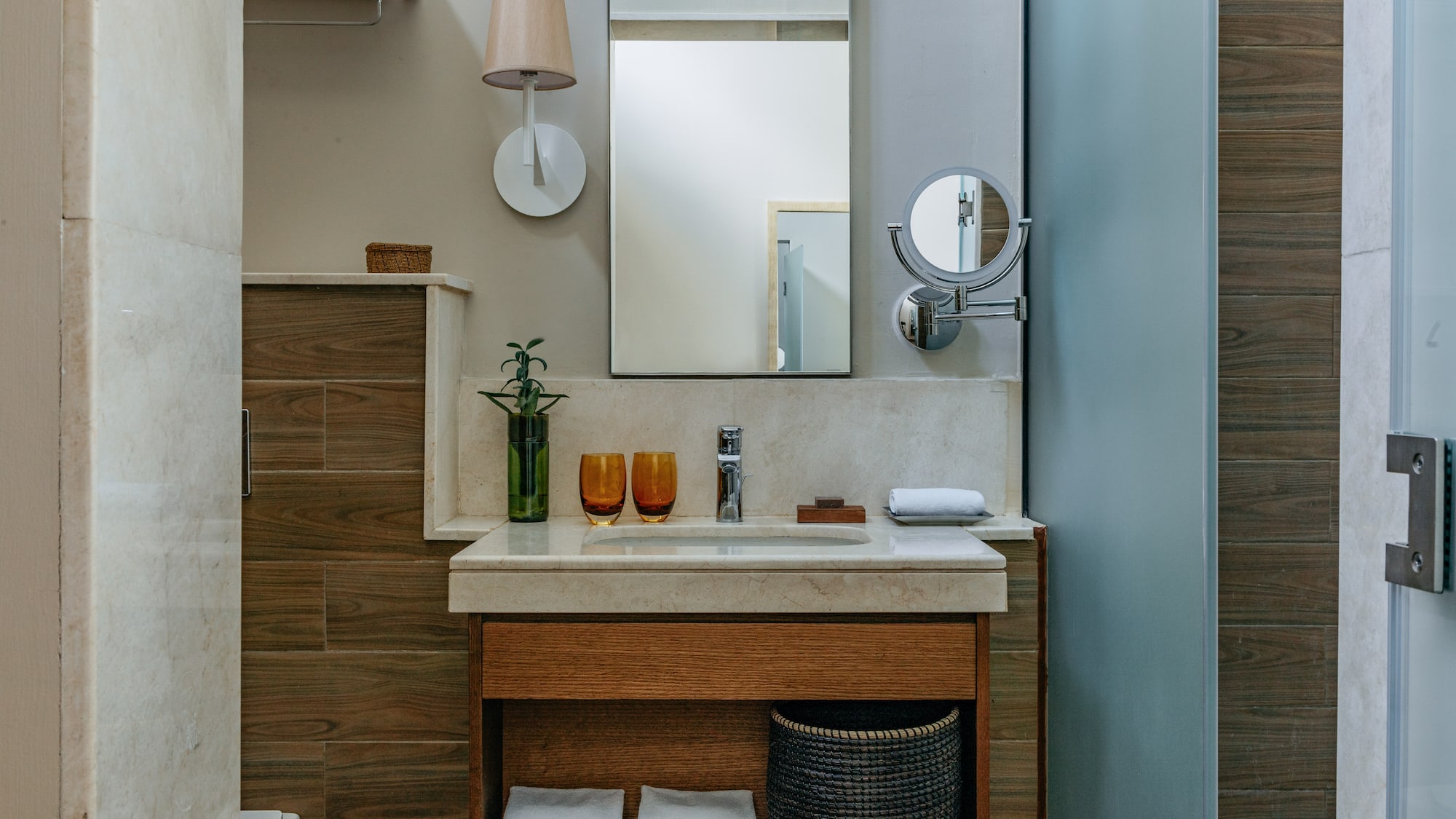 a bathroom with a mirror and sink