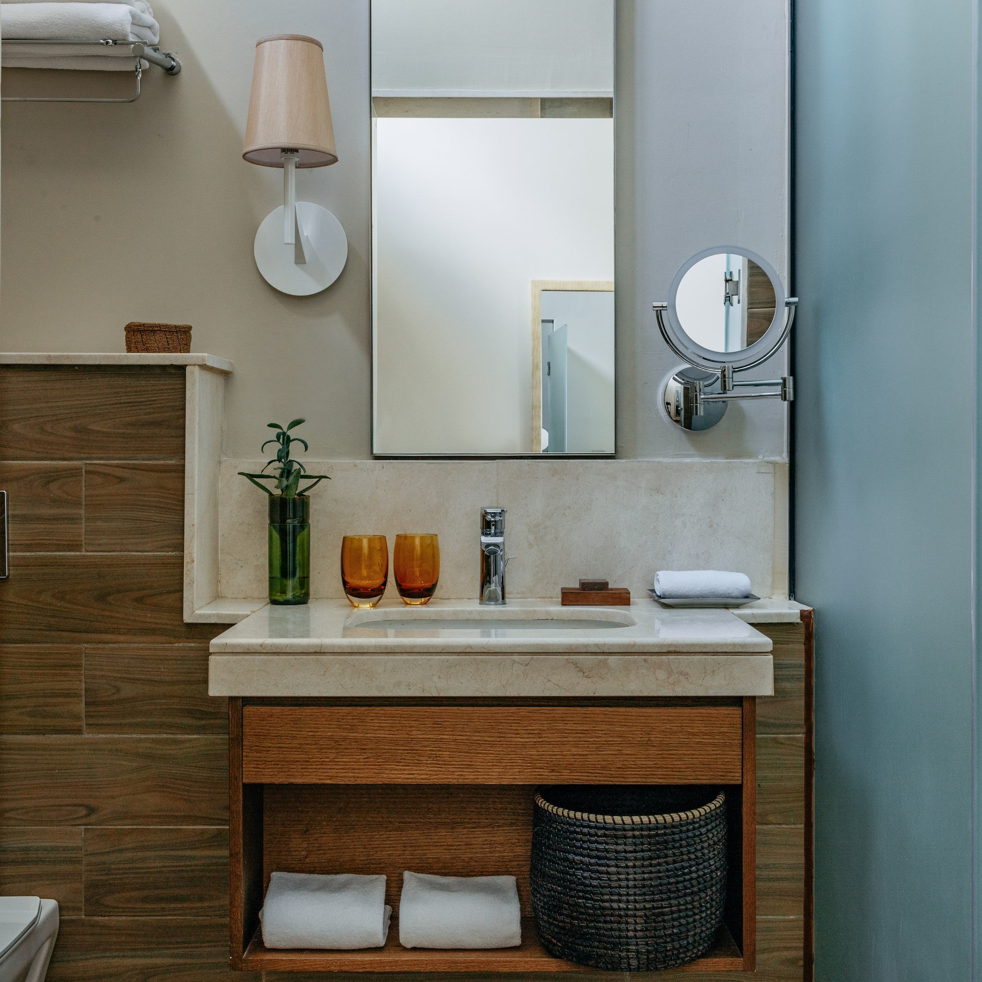 a bathroom with a mirror and sink