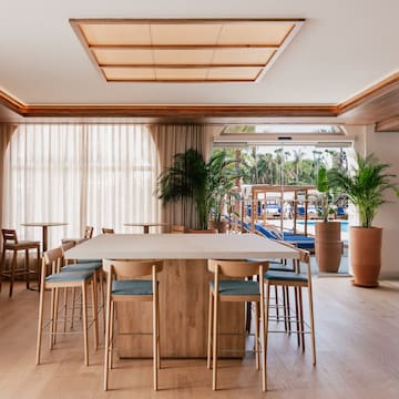 a room with a table and chairs