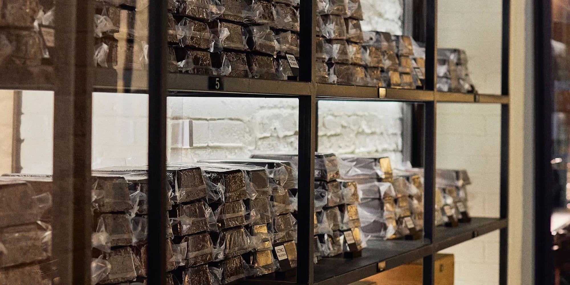 a shelf with many boxes of chocolate