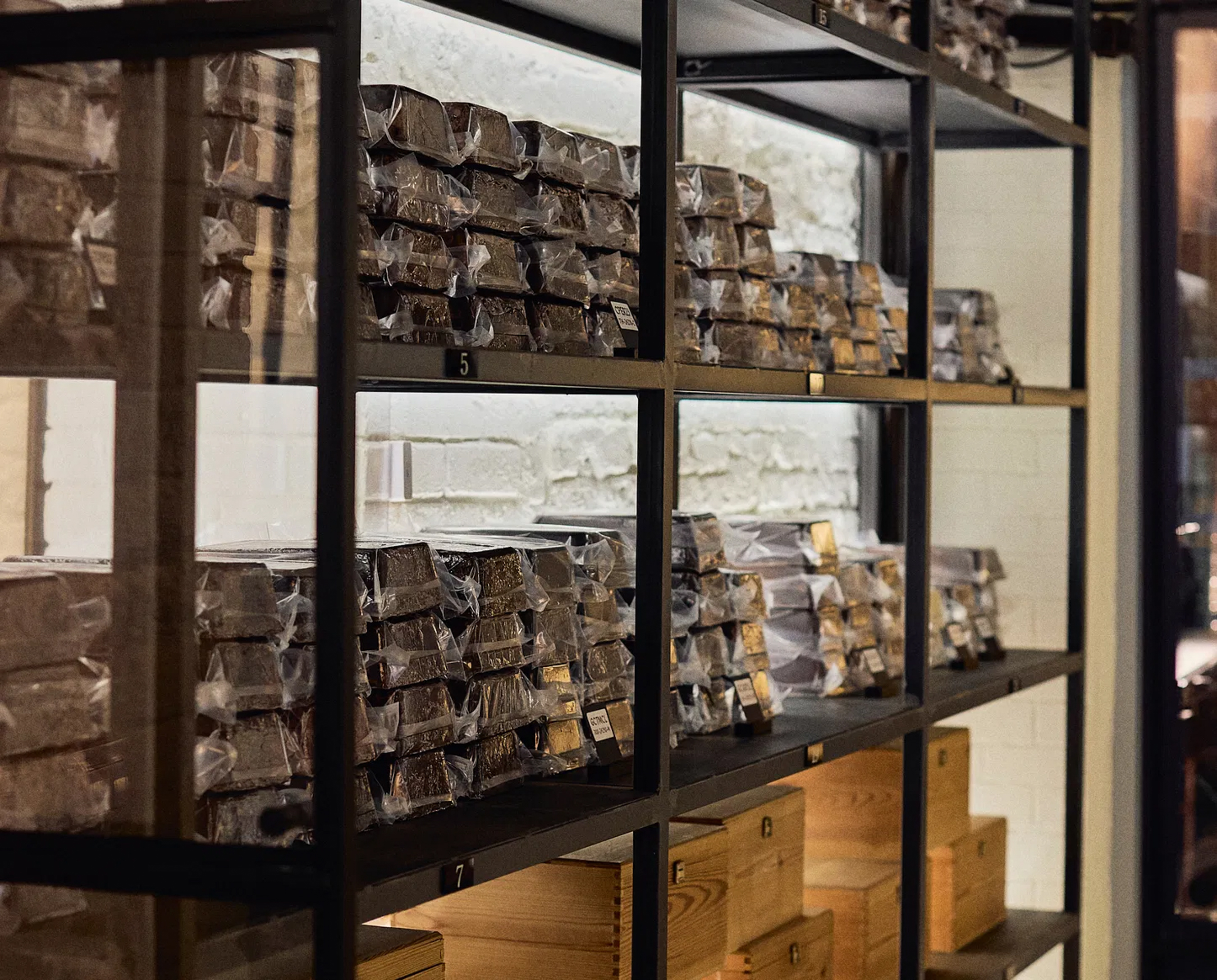 a shelf with many boxes of chocolate