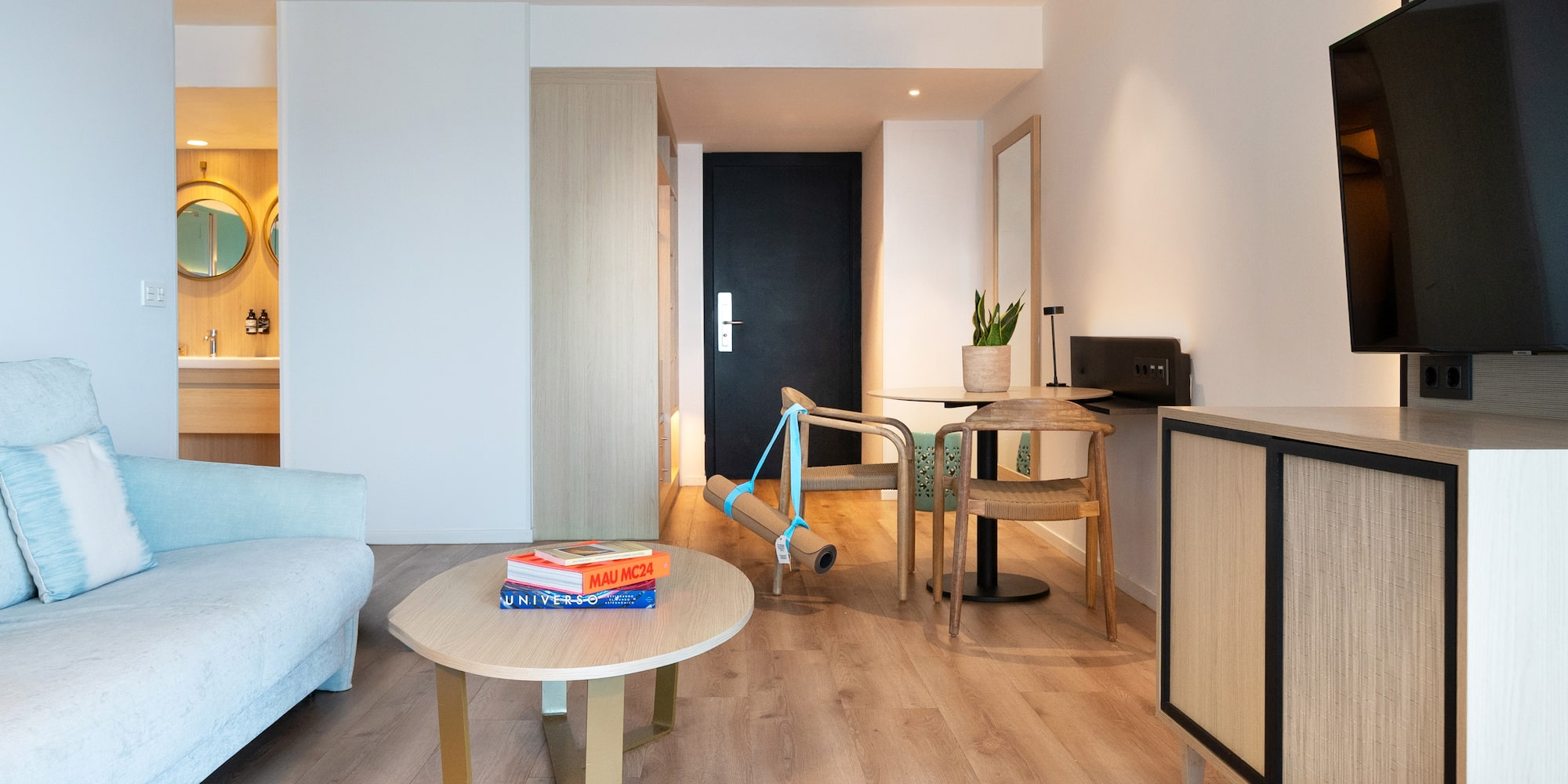 a living room with a couch and a table