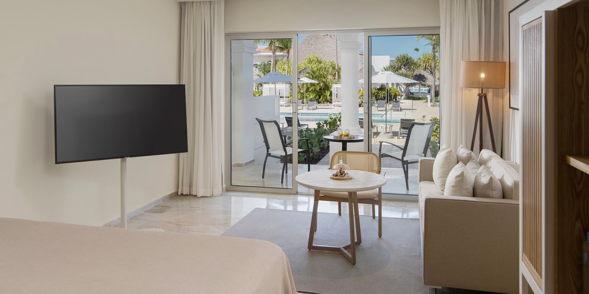 a room with a television and a bed