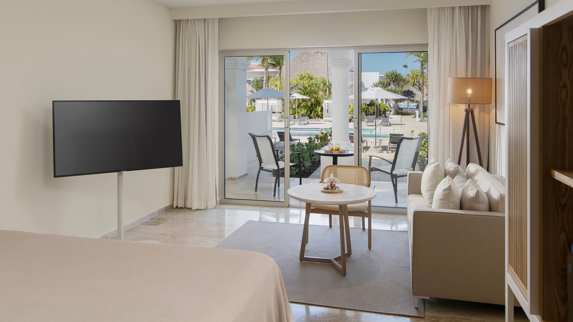 a room with a television and a bed