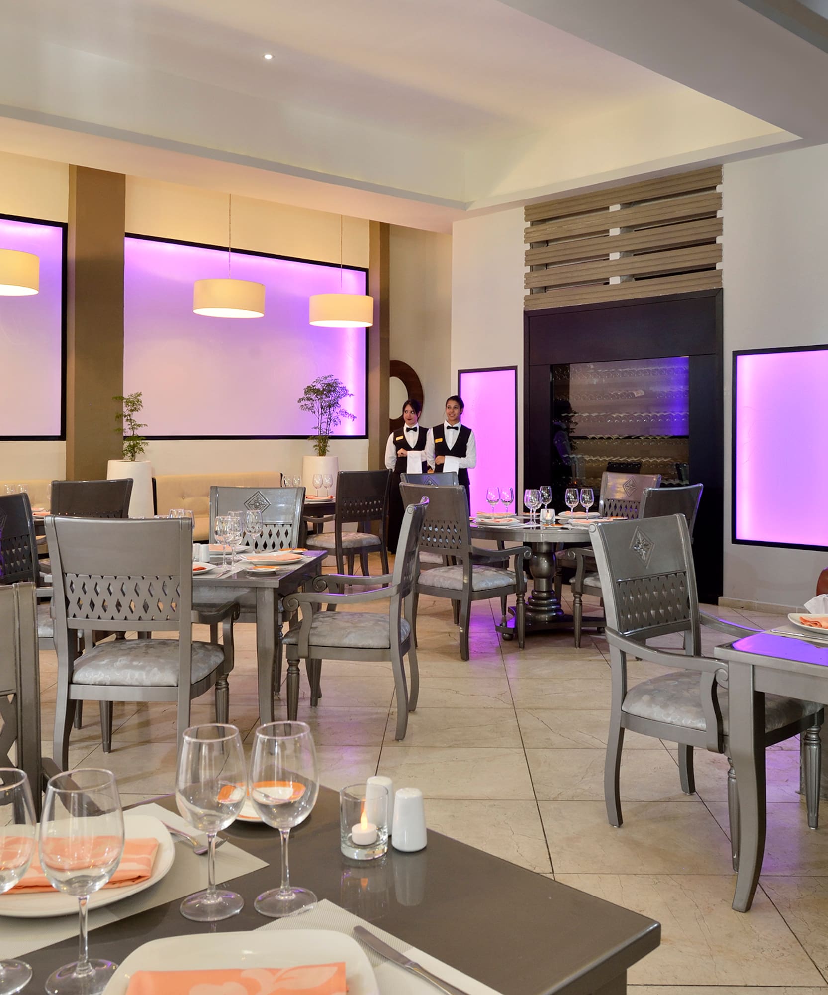 a restaurant with tables and chairs