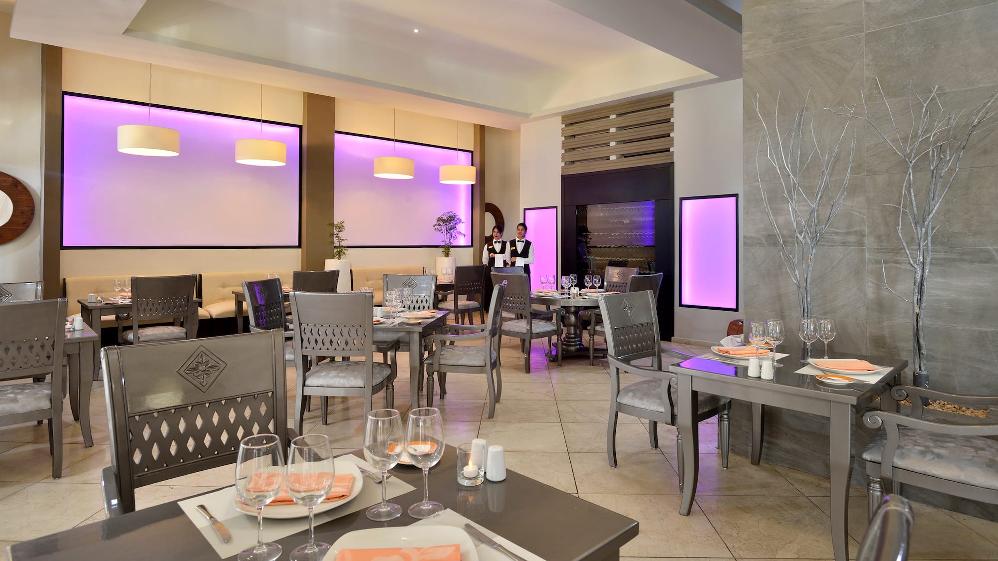 a restaurant with tables and chairs