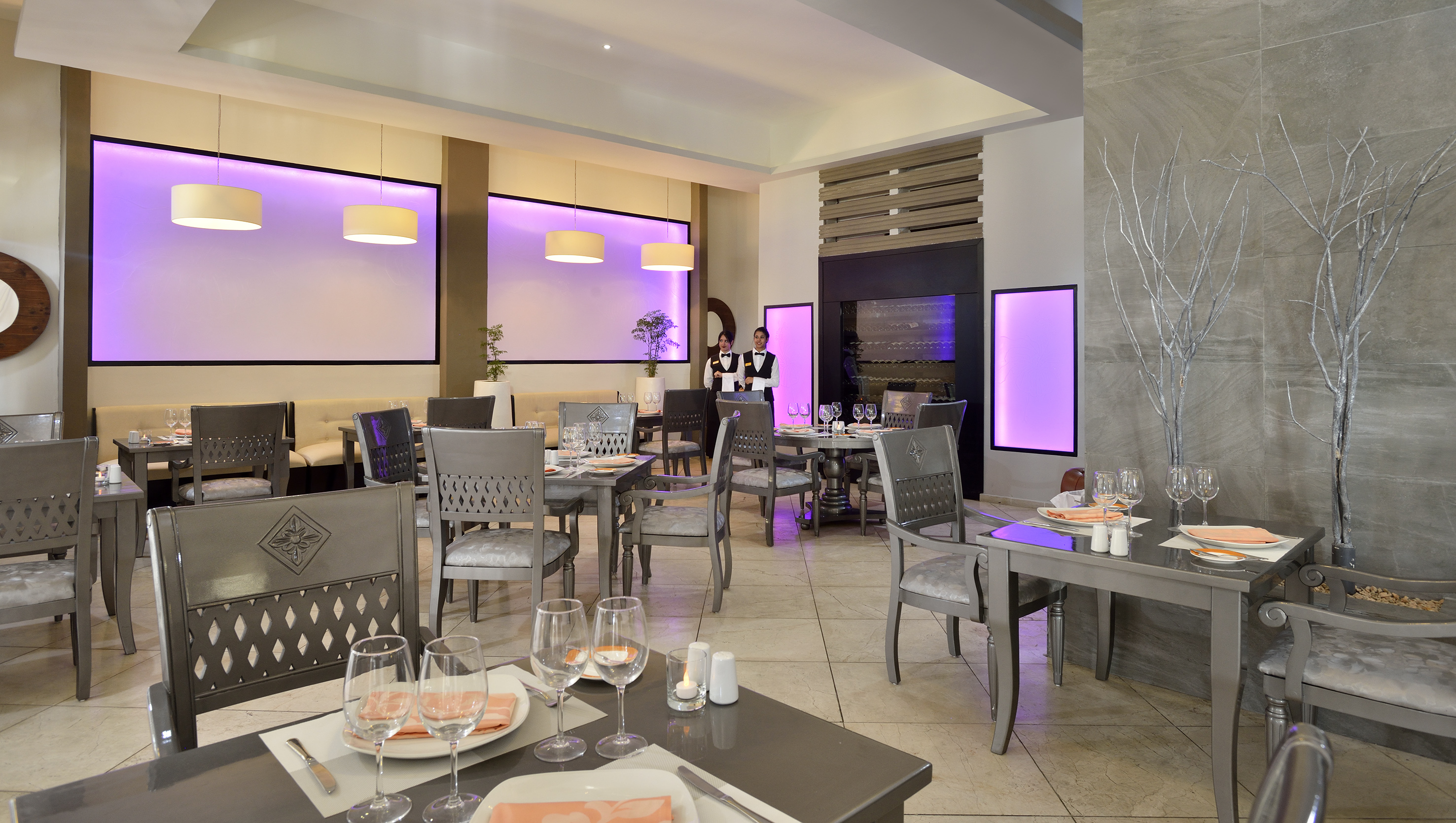 a restaurant with tables and chairs