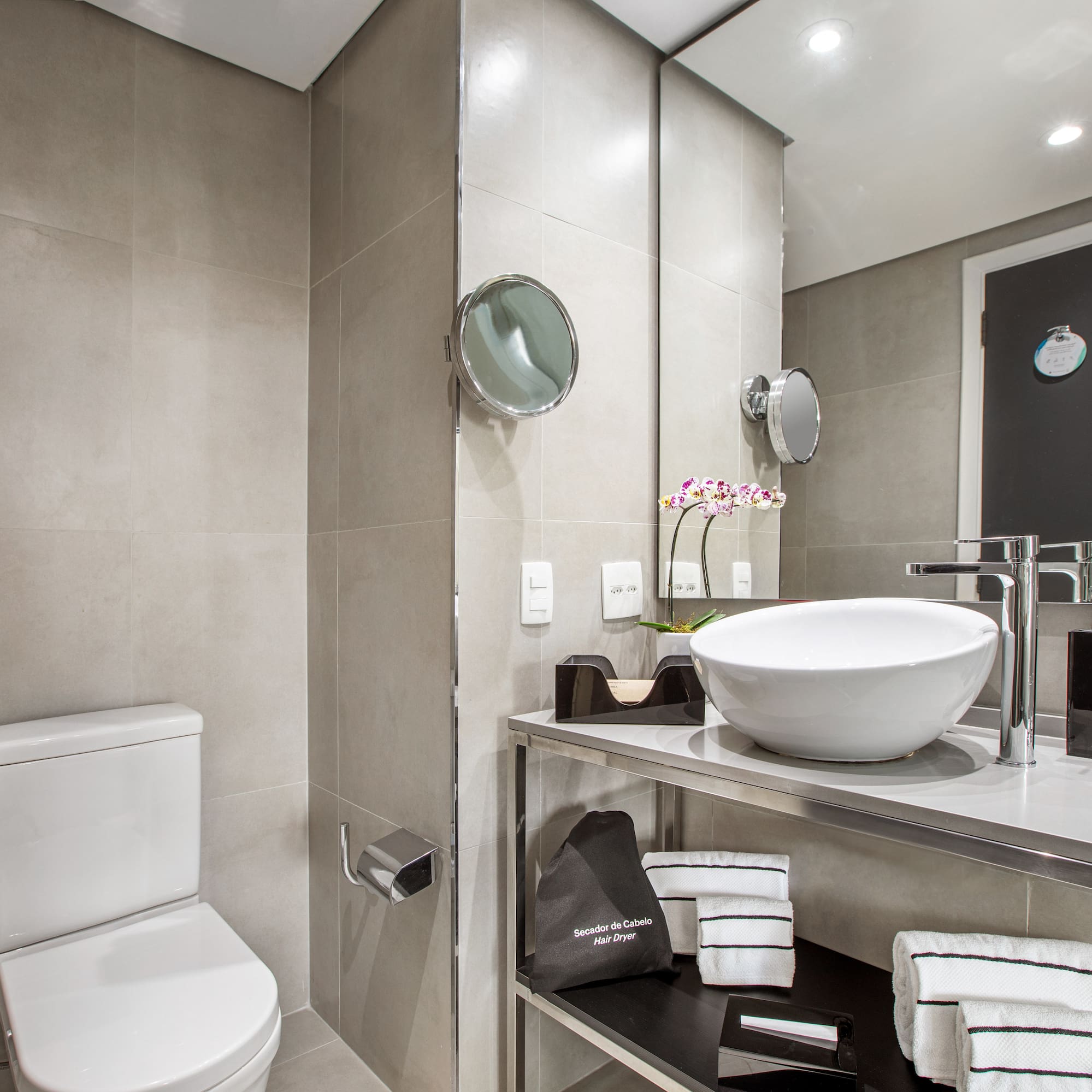 a bathroom with a sink and toilet