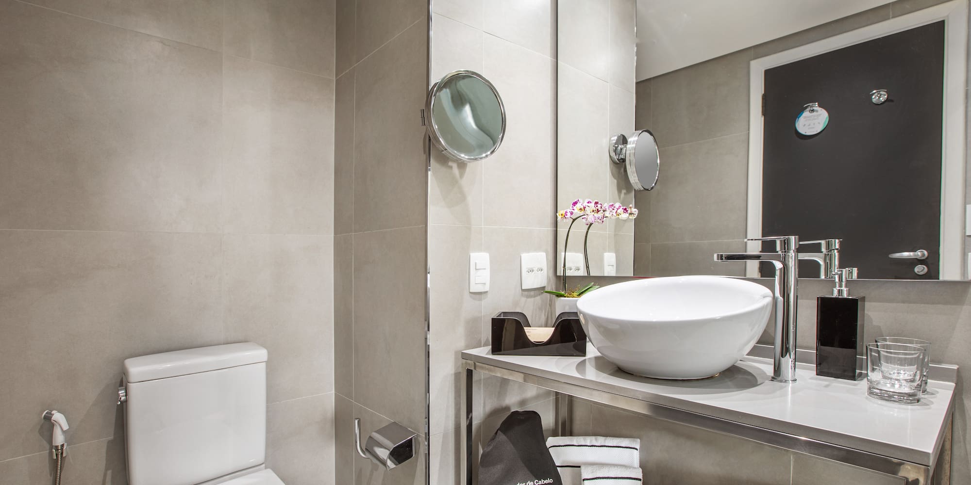 a bathroom with a sink and toilet