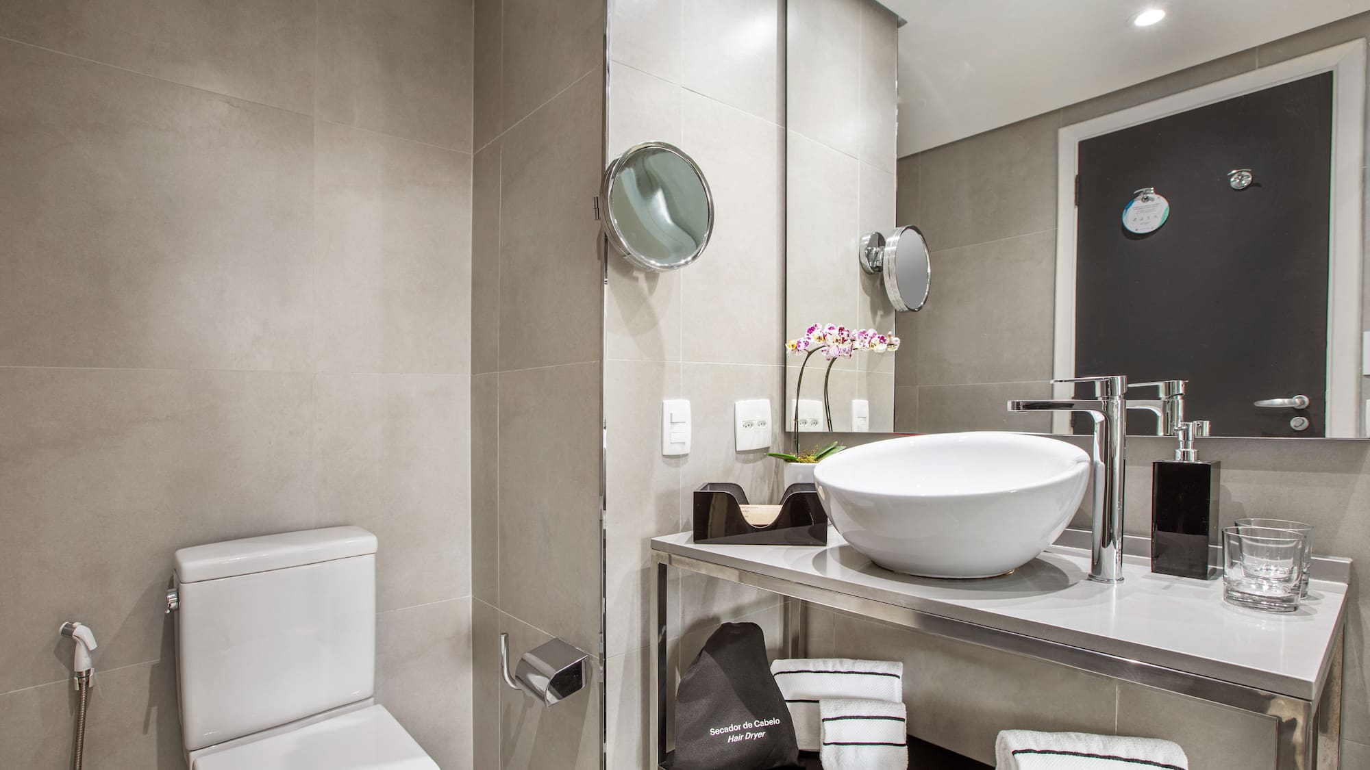a bathroom with a sink and toilet
