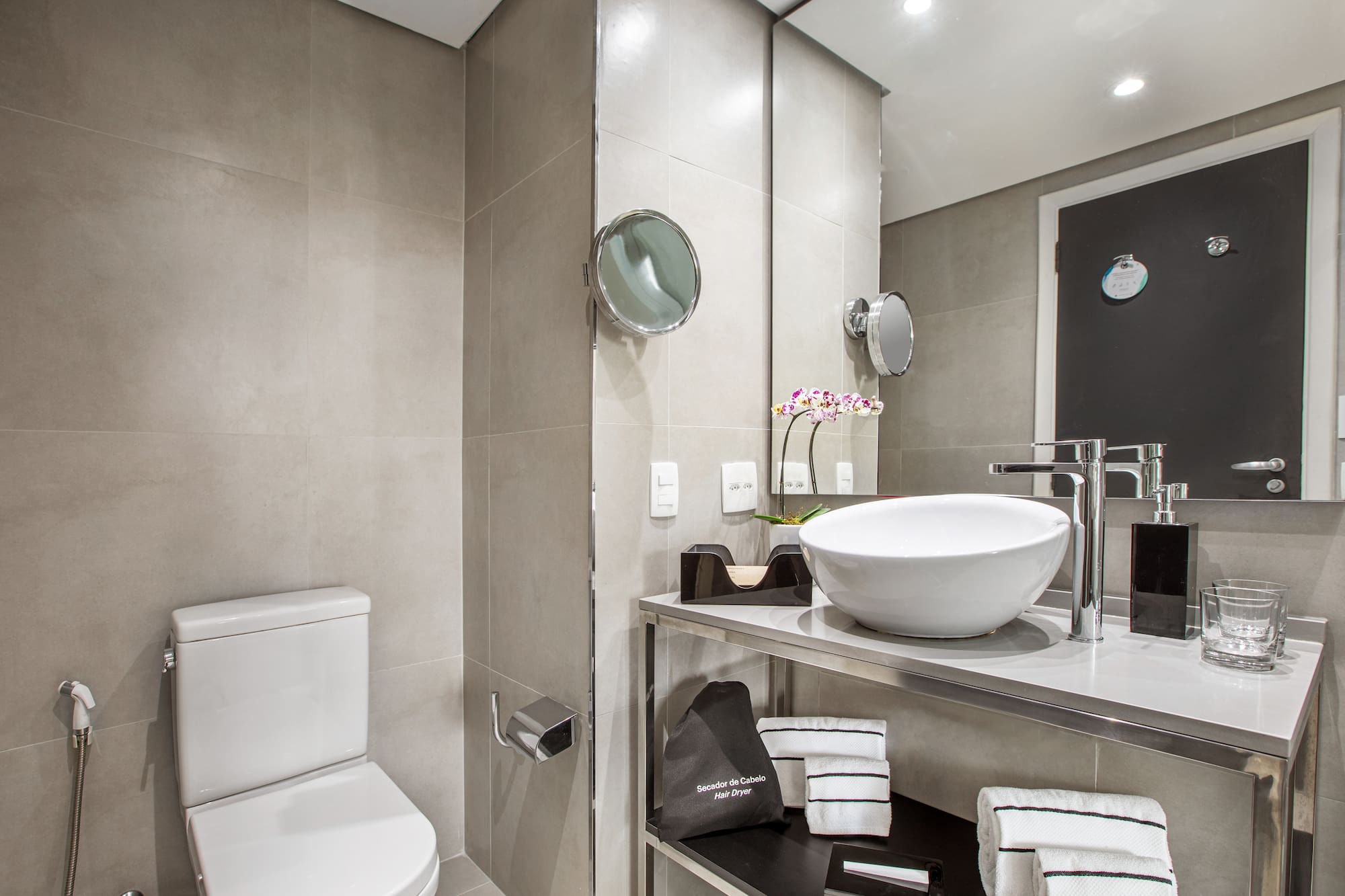 a bathroom with a sink and toilet